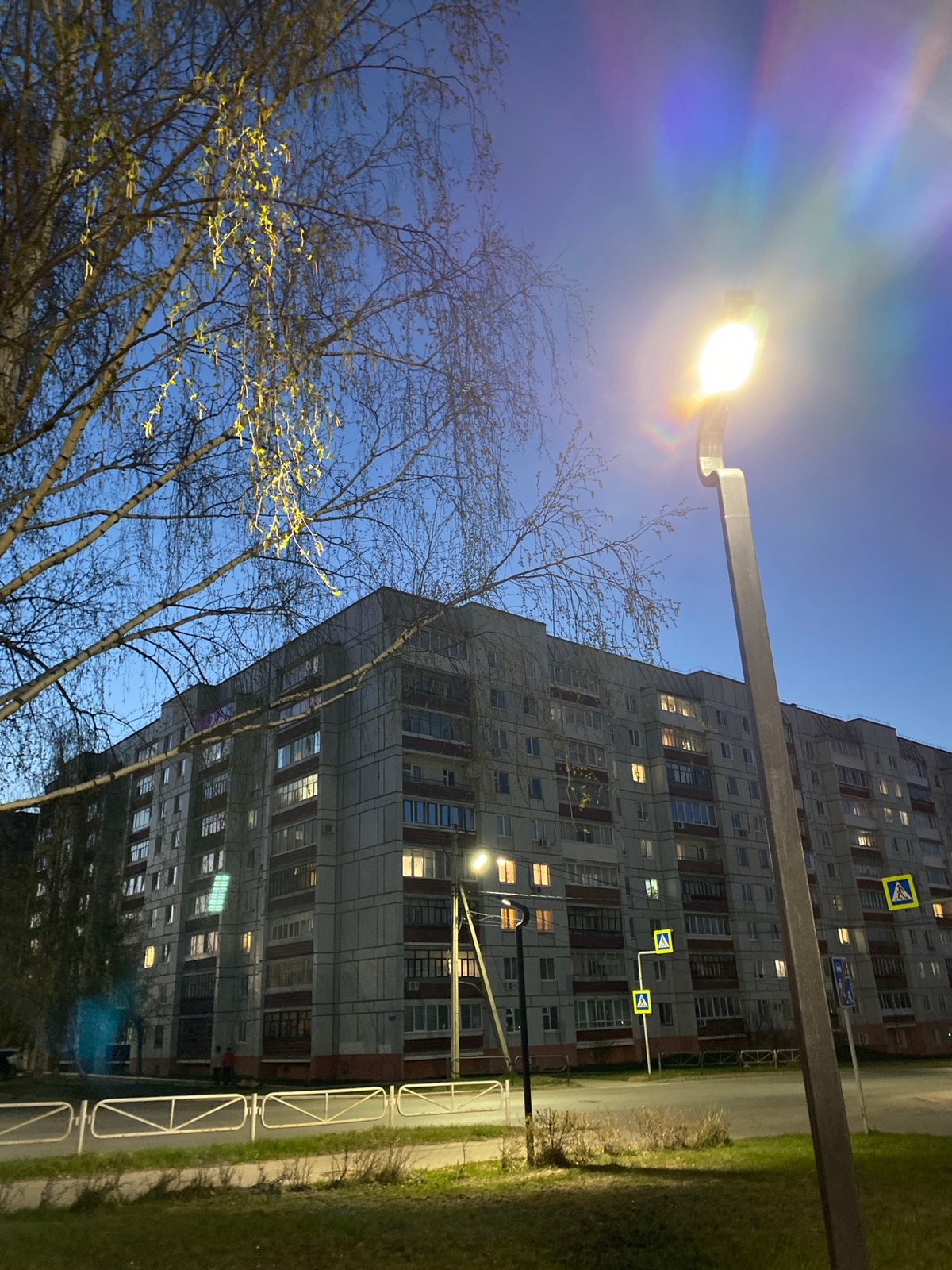 Everyday life captured across Chaikovsky, Russia during spring evening