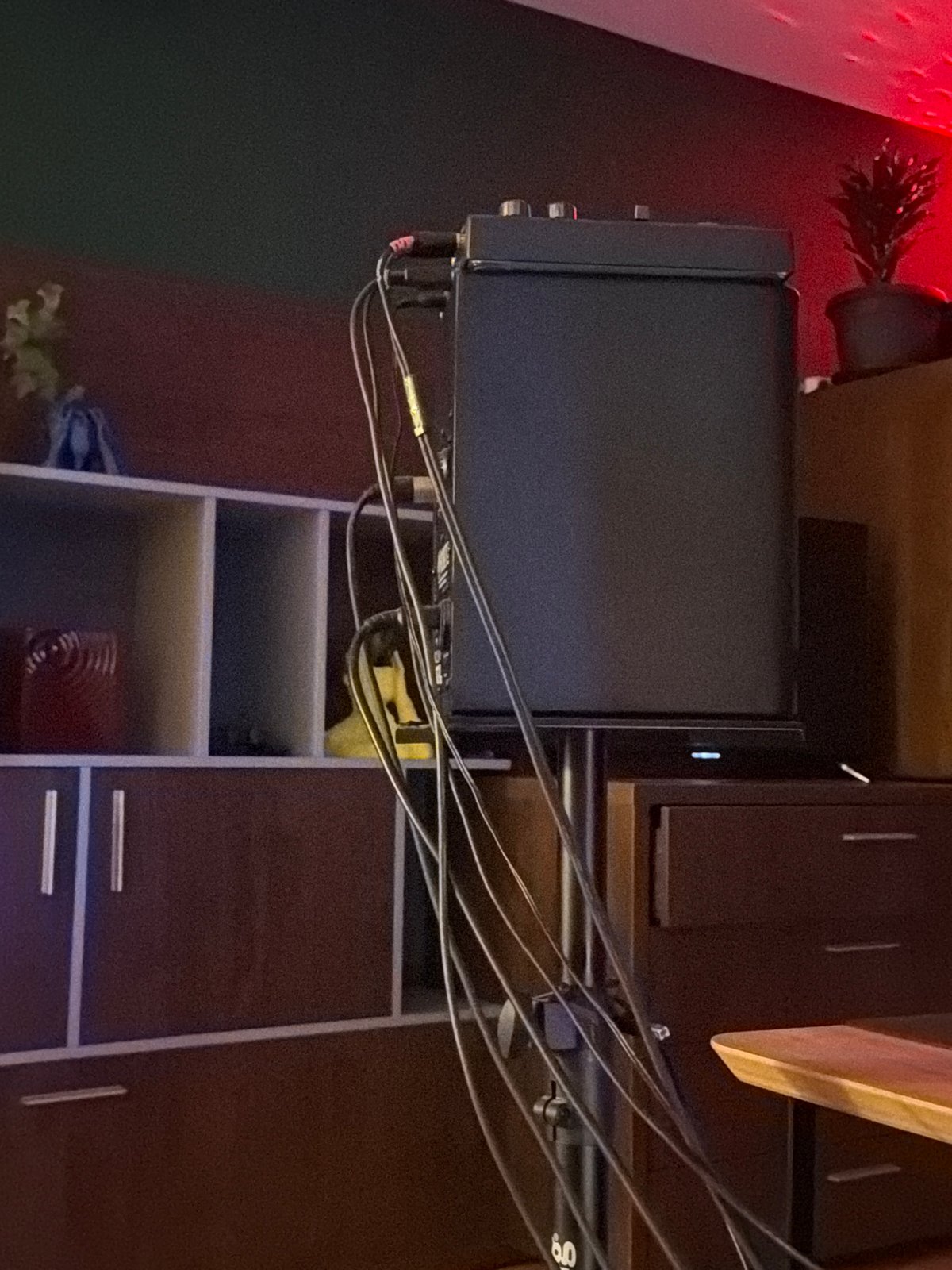 Late-night indoor gathering documented in Sofia with music equipment