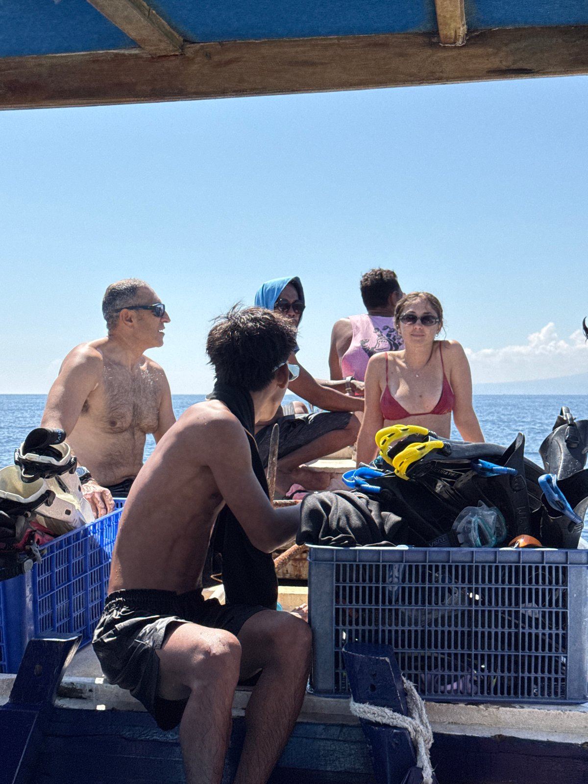 Scuba diving group conducts underwater excursion in Indonesian waters