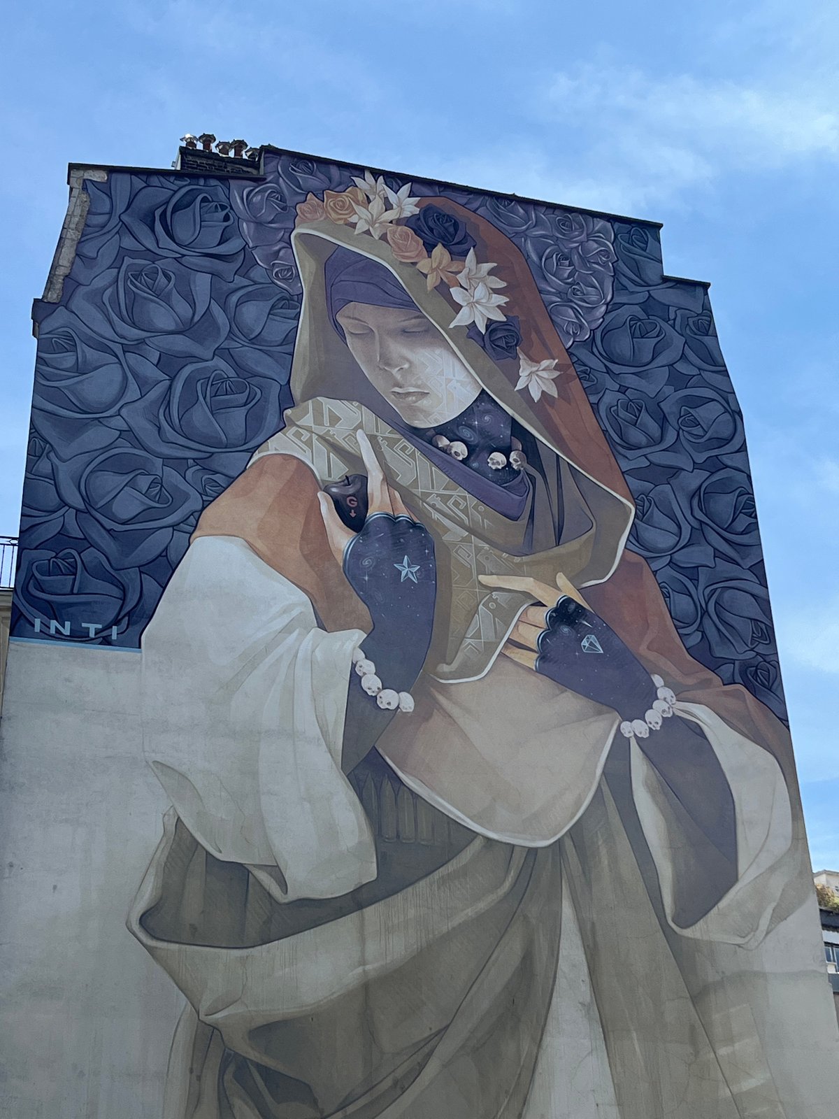 Murals and modernist architecture on a Paris street