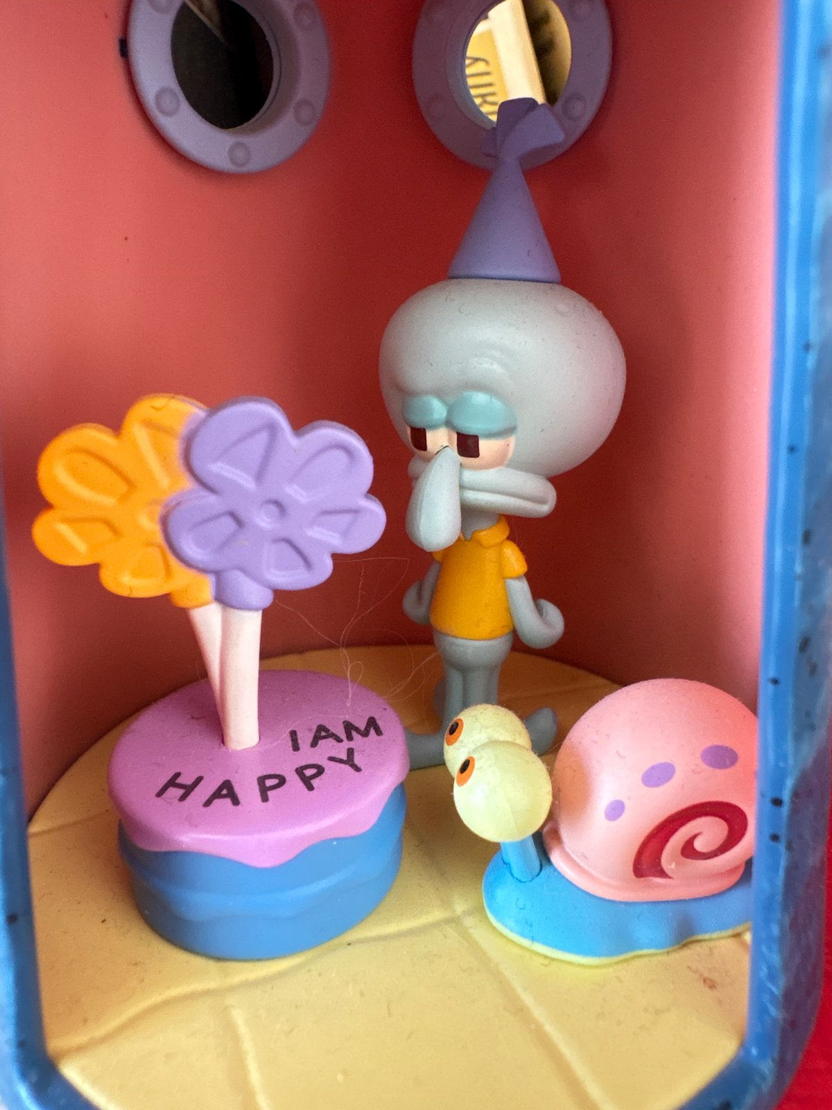 City architecture, collectible toys, and curio shop finds