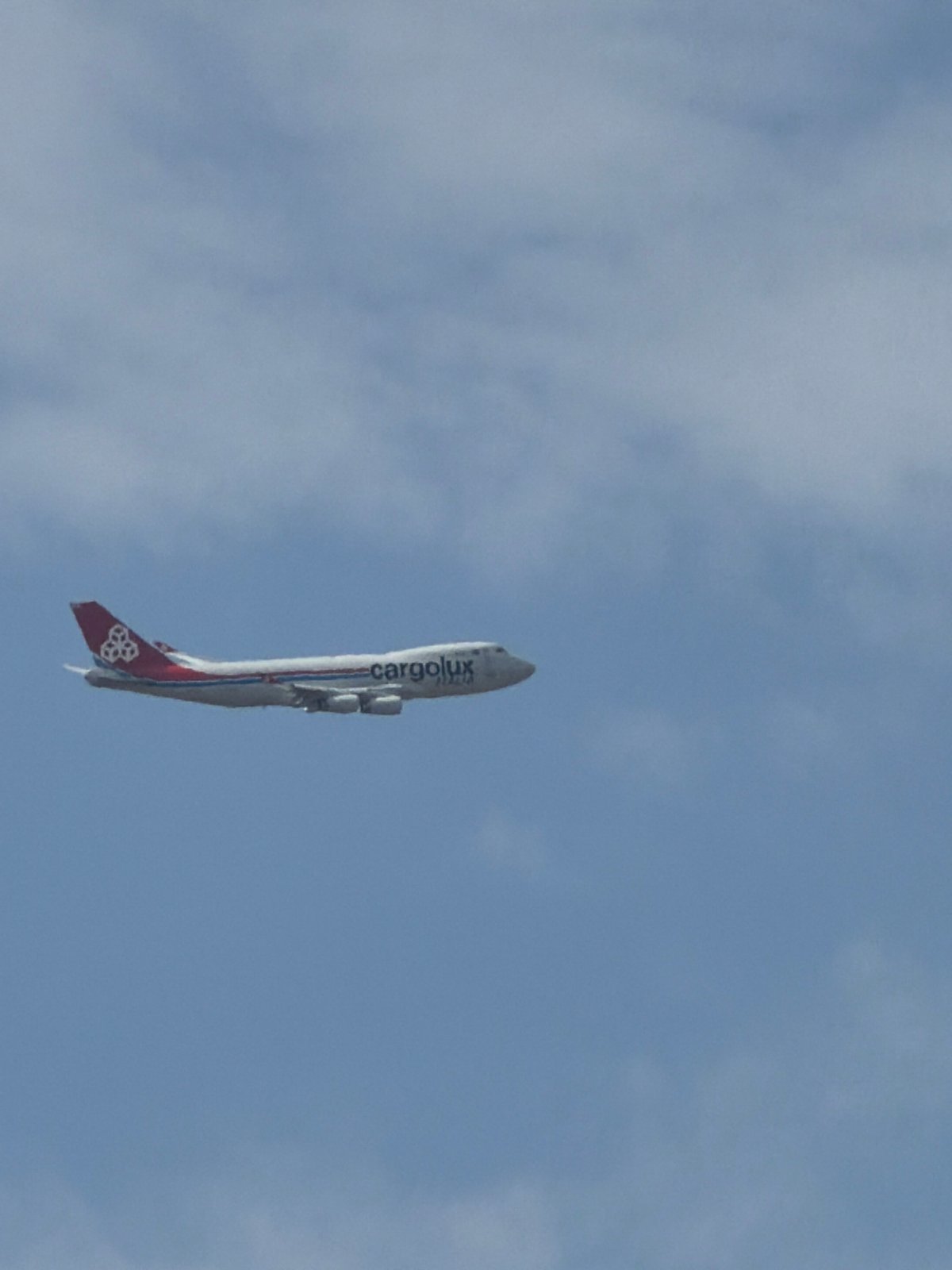 Cargolux overhead, Harley on the road, sunny skies in Luxembourg