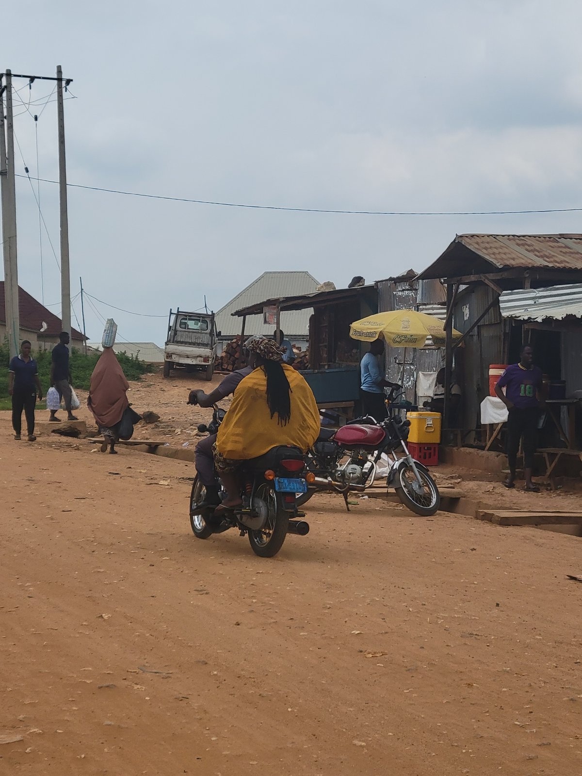 Daily life unfolds in Keffi, Nigeria streets and markets