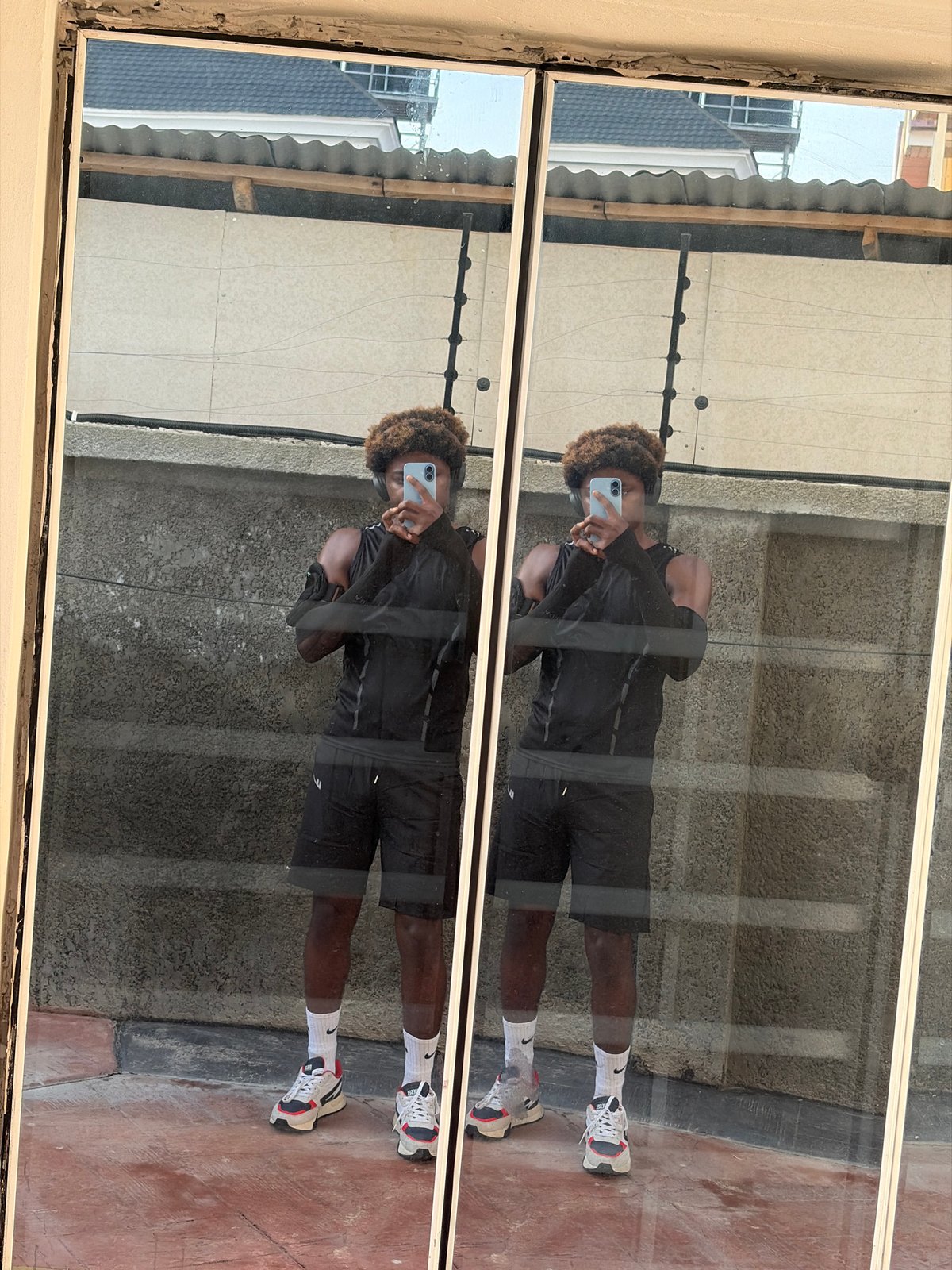 Morning selfie and street vendor captured in Igboefon, Nigeria