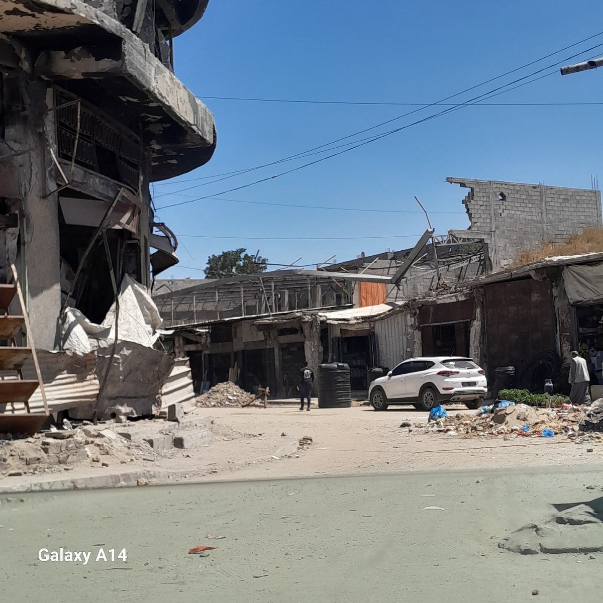 Witness documents widespread building damage and debris in Gaza City