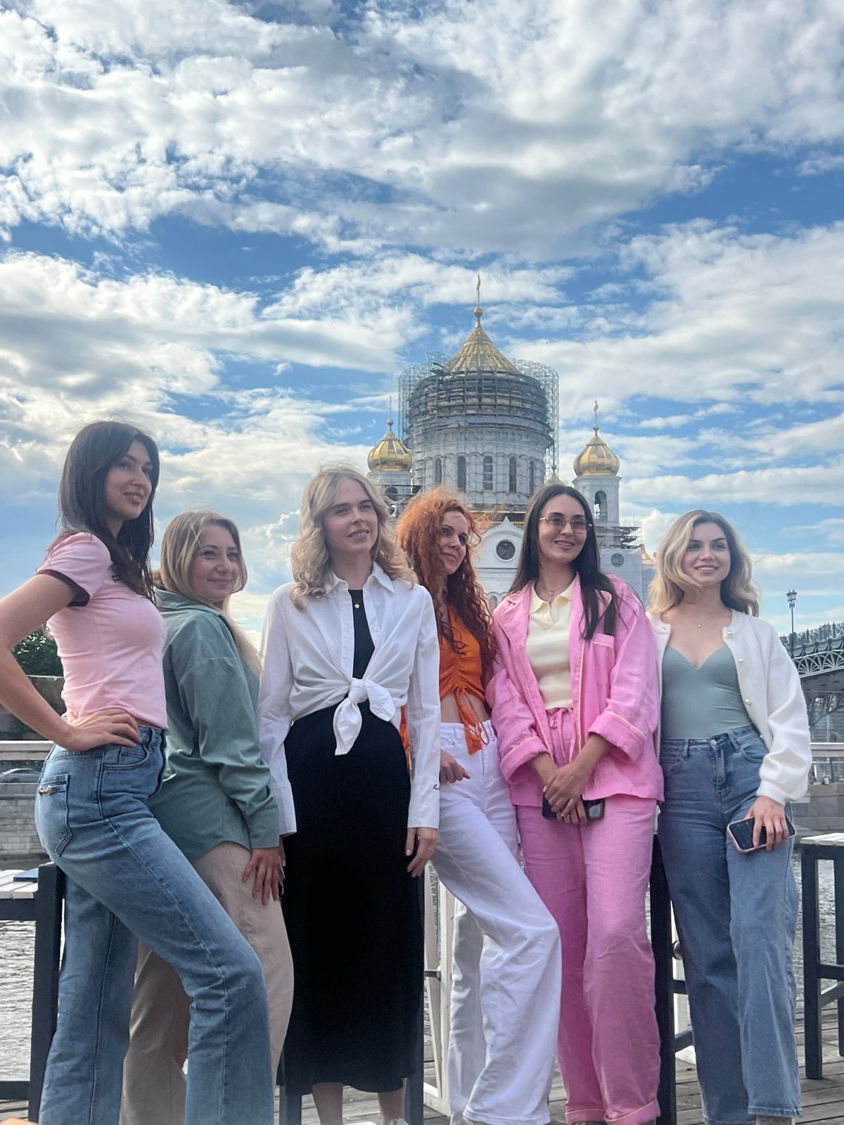 Women enjoy riverside café outing near Moscow's Christ Saviour Cathedral