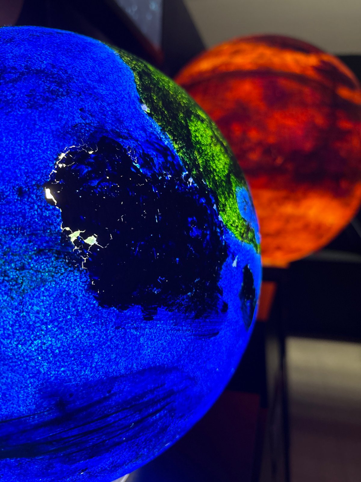 Two globes observed in Kazan, Russia display contrasting colors