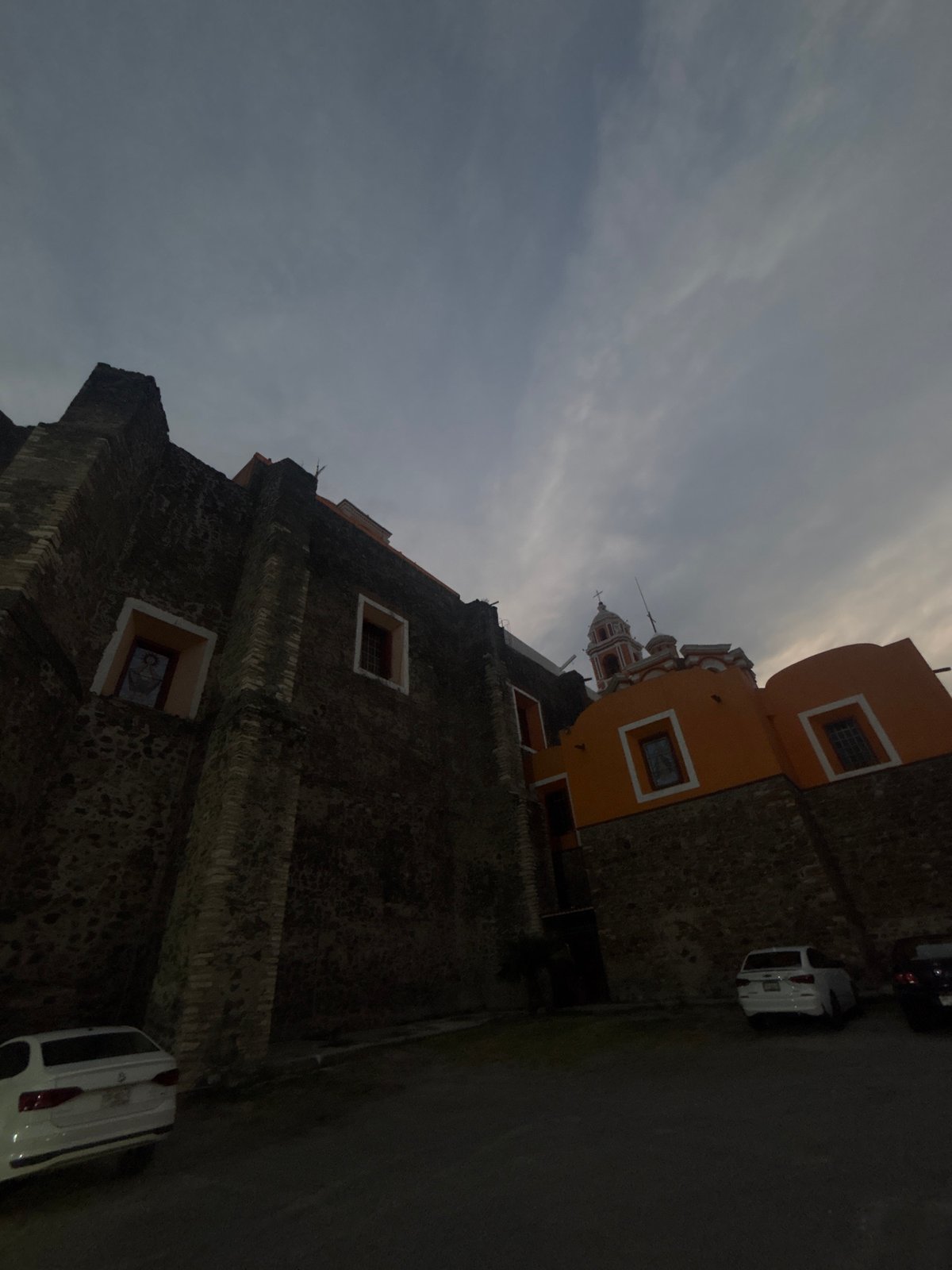 Historic stone building photographed in San Andrés Cholula