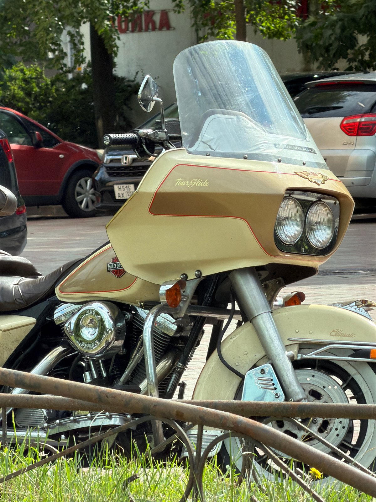 Harley-Davidson parked on a Saint Petersburg sidewalk, midday