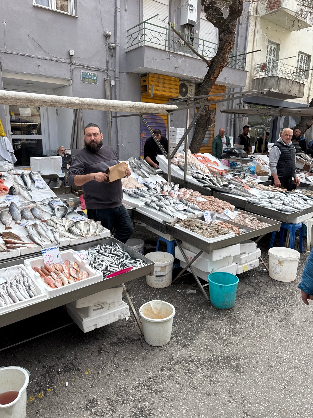 Outdoor fish market operates on Thessaloniki street Saturday morning