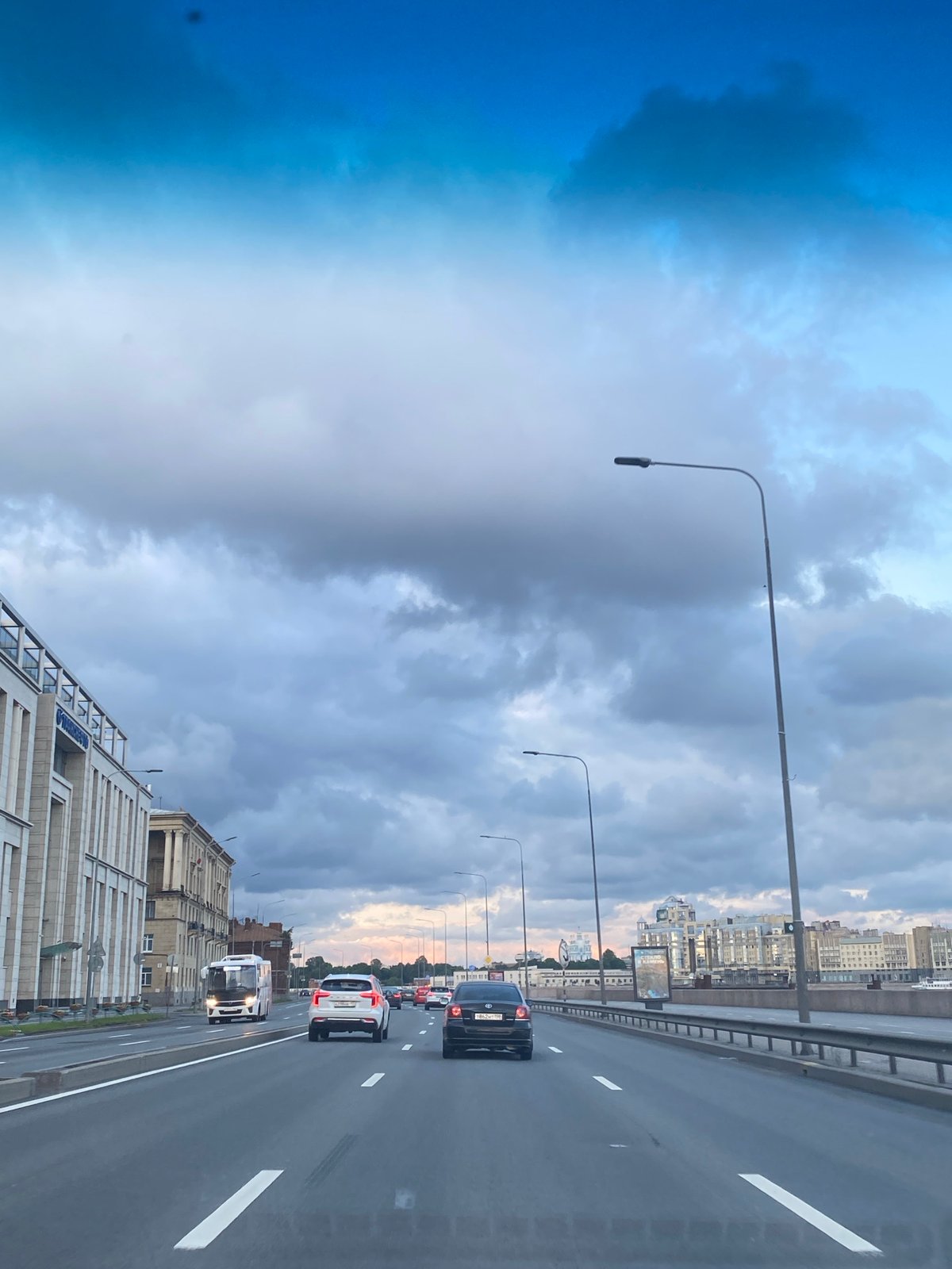 Storm clouds building over a Saint Petersburg highway