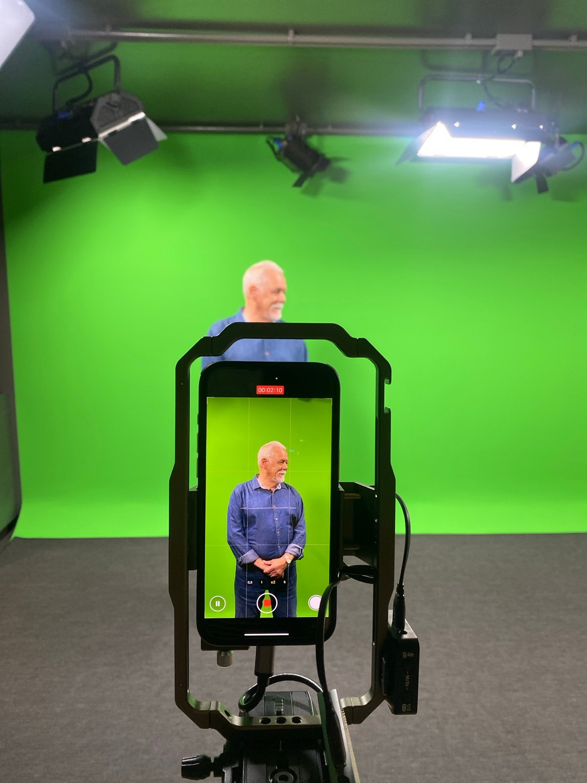 Video production underway at Madrid studio with green screen setup