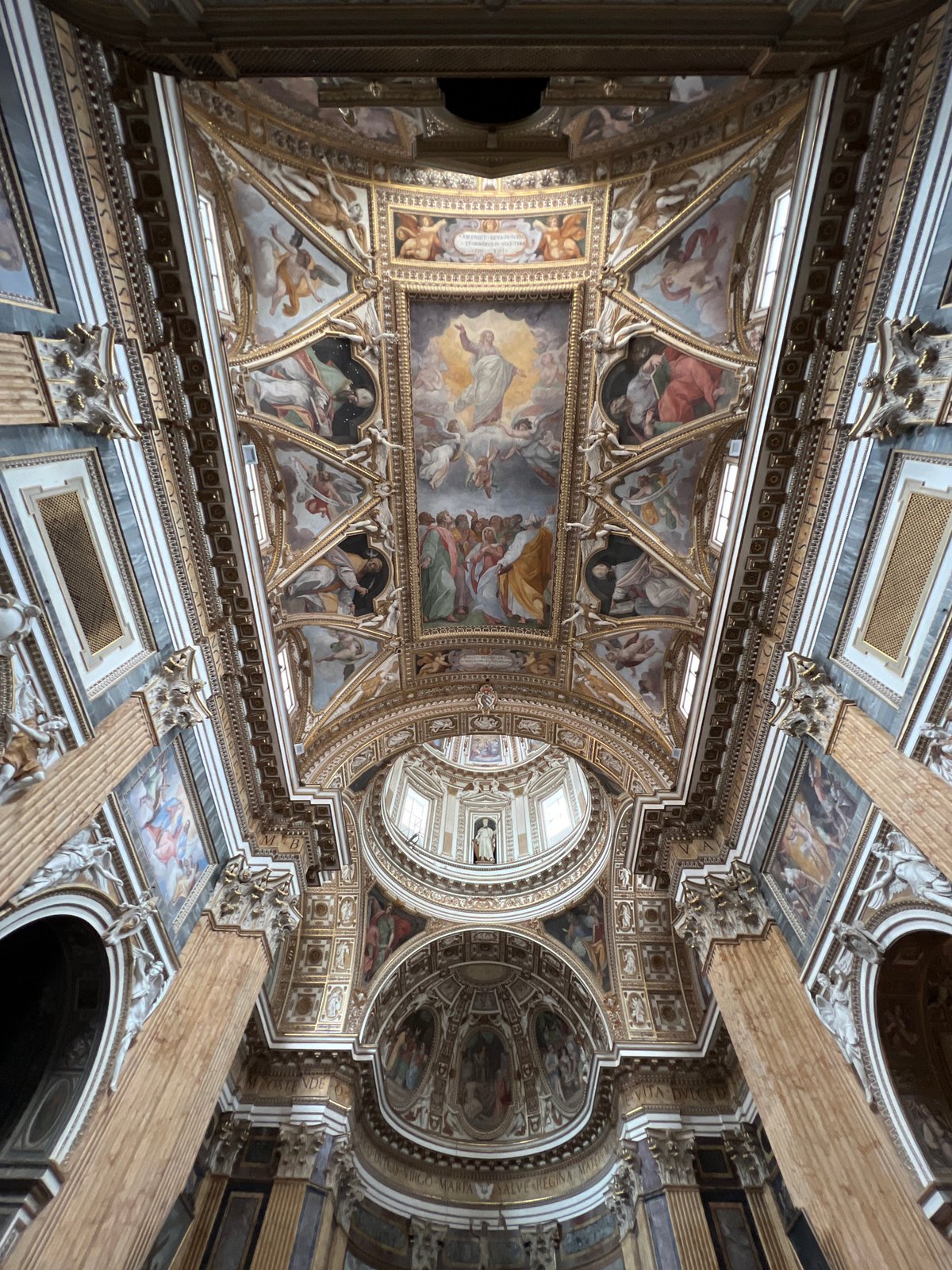 Tourist documents ornate Roman basilica architecture during afternoon visit