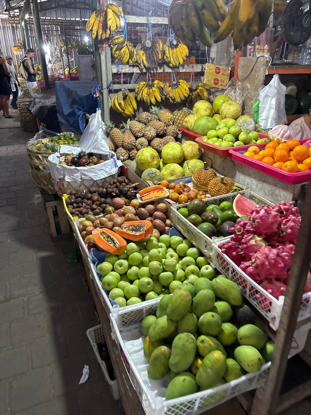 Fruit vendor displays tropical produce in Ungasan, Indonesia
