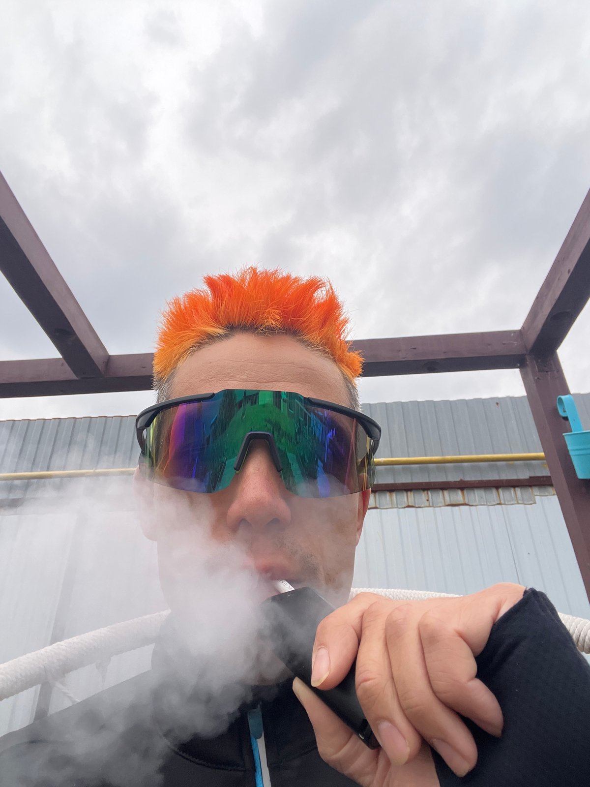Orange-haired individual enjoys morning outdoor activities in Chaikovsky, Russia