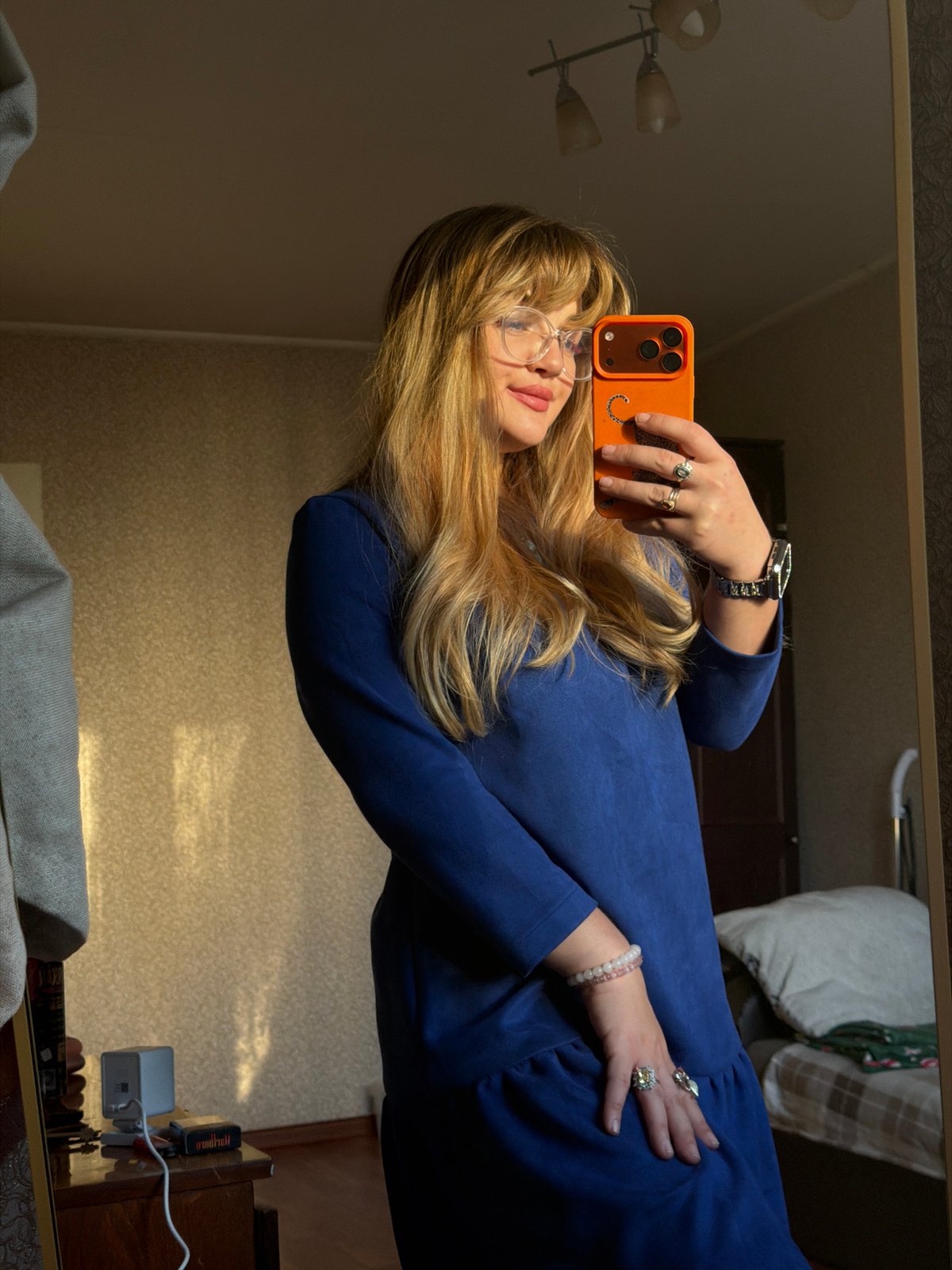 Woman takes mirror selfies in Russian city apartment