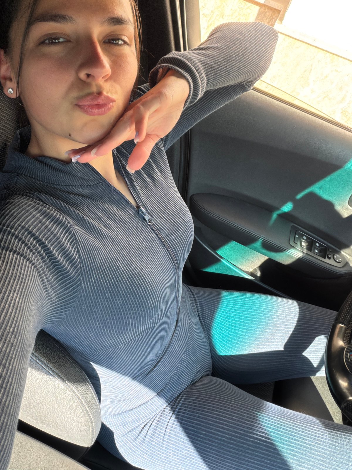 Woman takes selfies in bathroom and BMW in Gabrovo