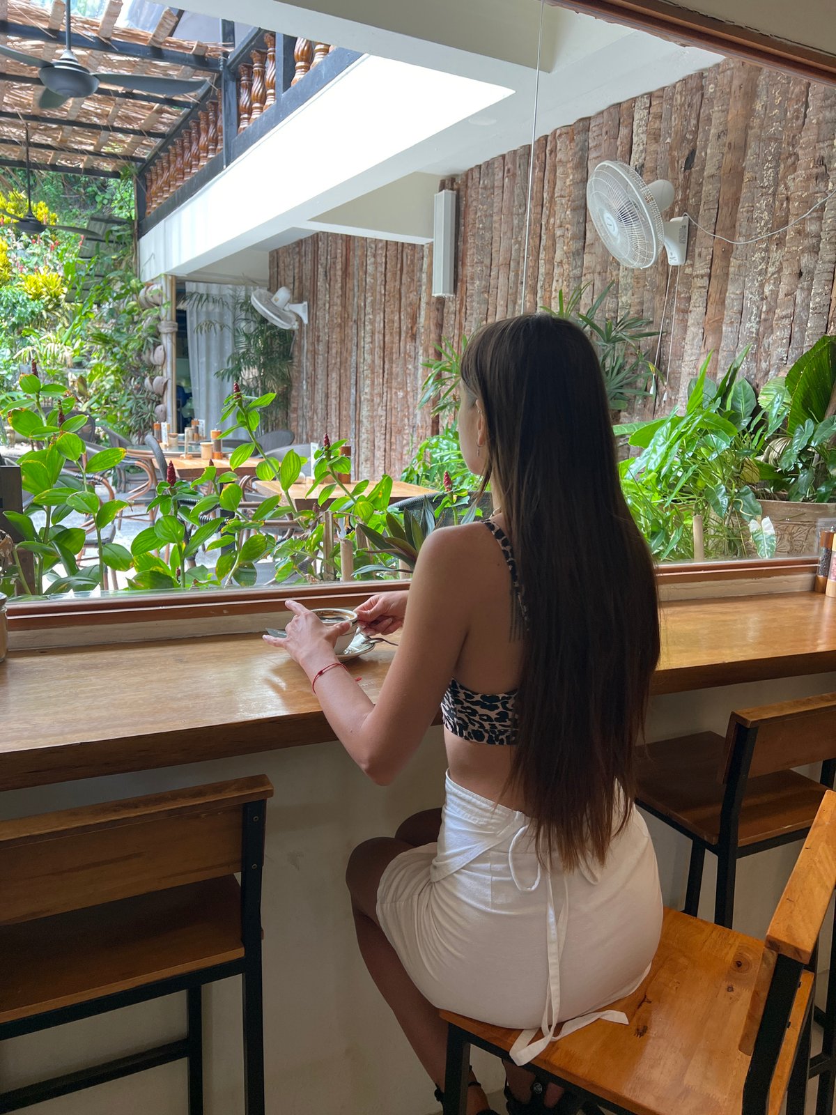 Coffee stop at a Koh Phangan cafe, leopard print and all