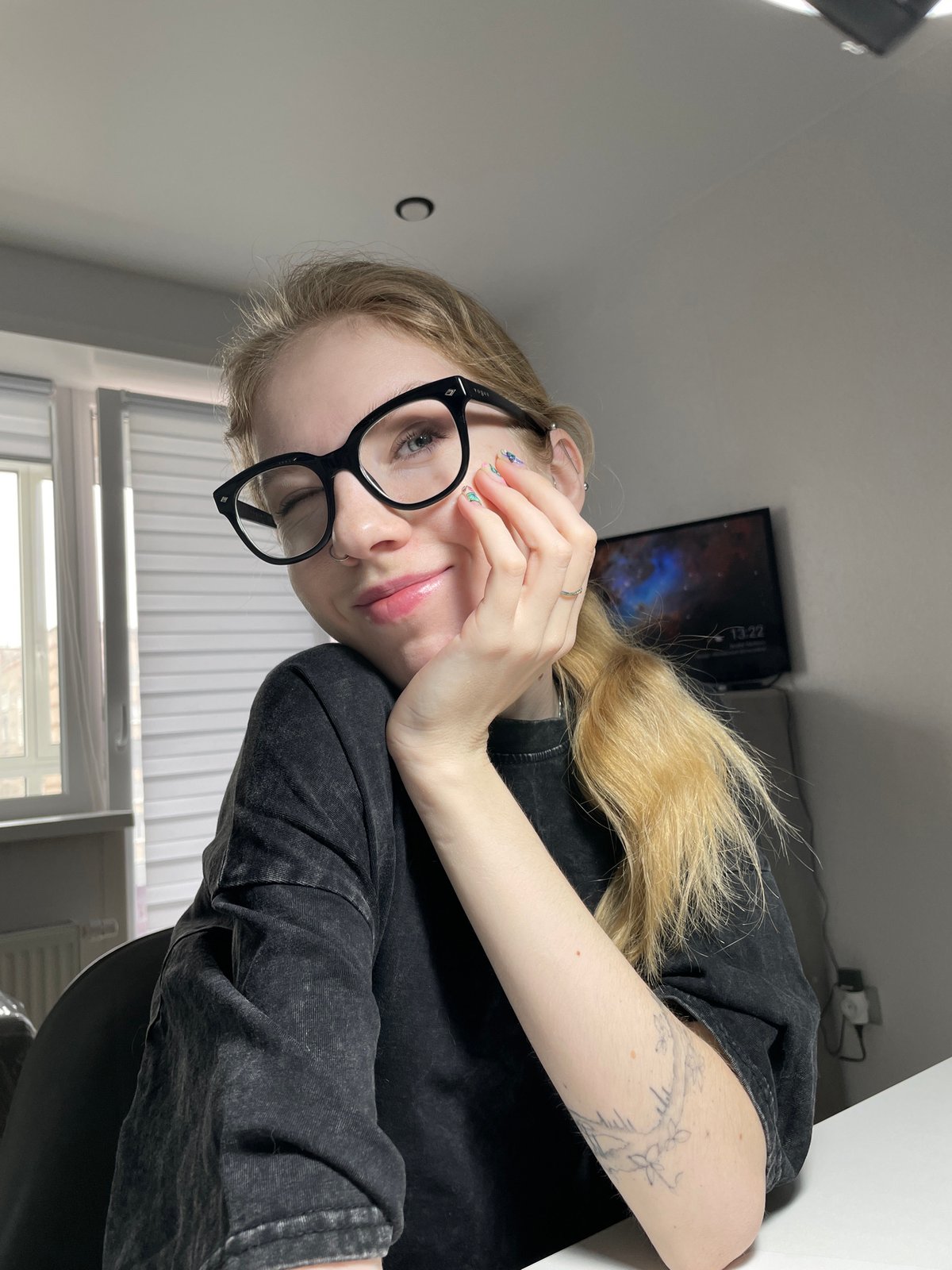 Person visits nail salon in Izhevsk, partially obscures face