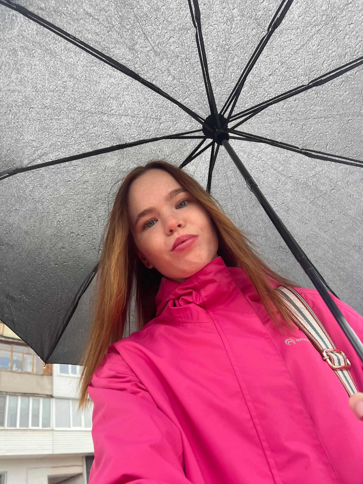Rainy morning street life documented in Chaikovsky, Russia