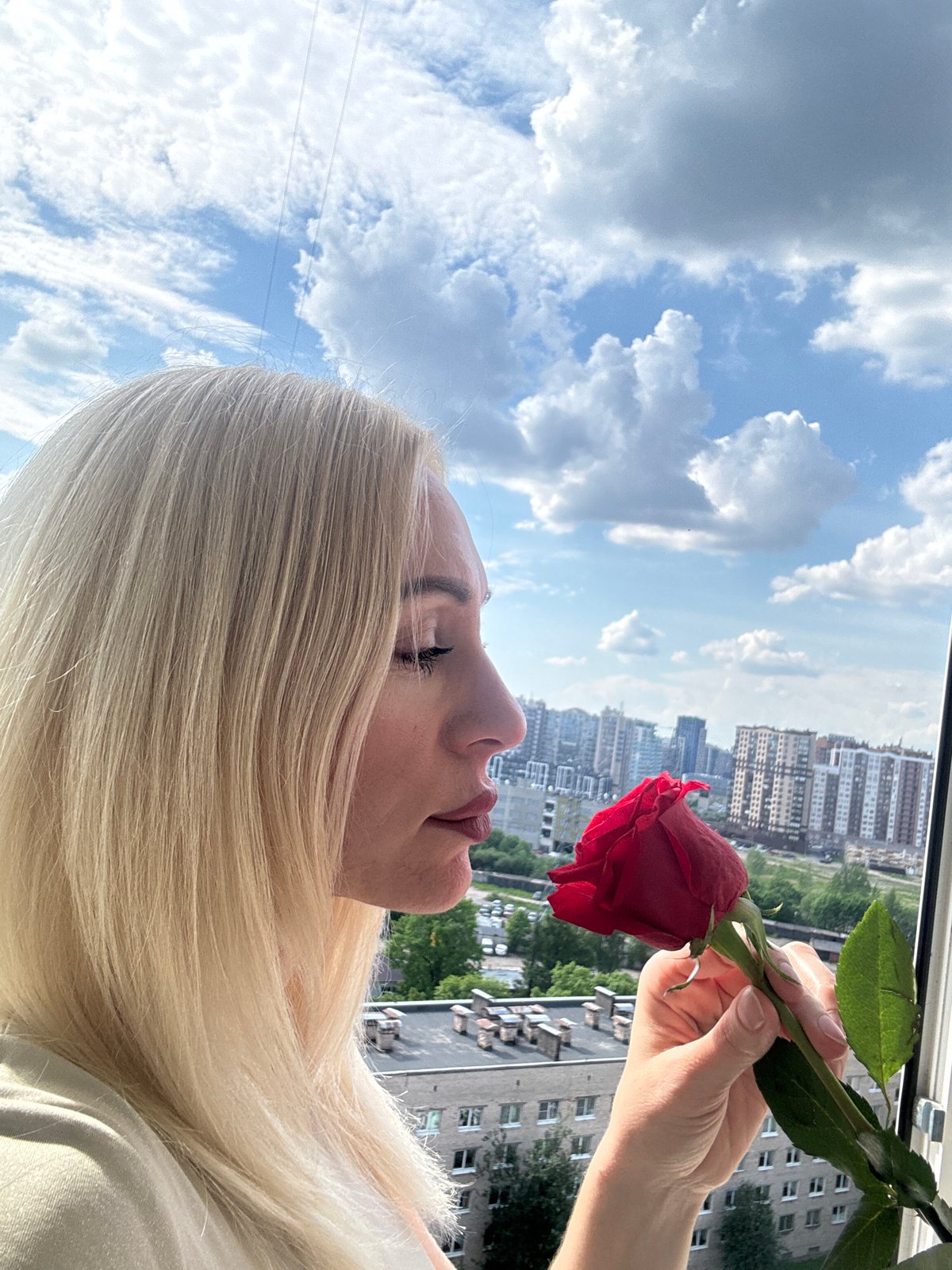 Woman photographed with red rose in multiple poses