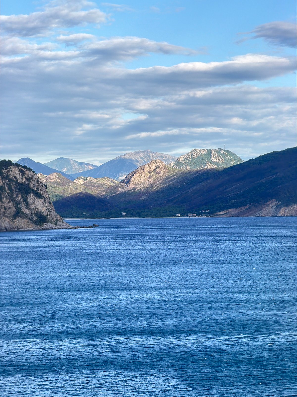 Coastal scenes and dog walking documented in Montenegro