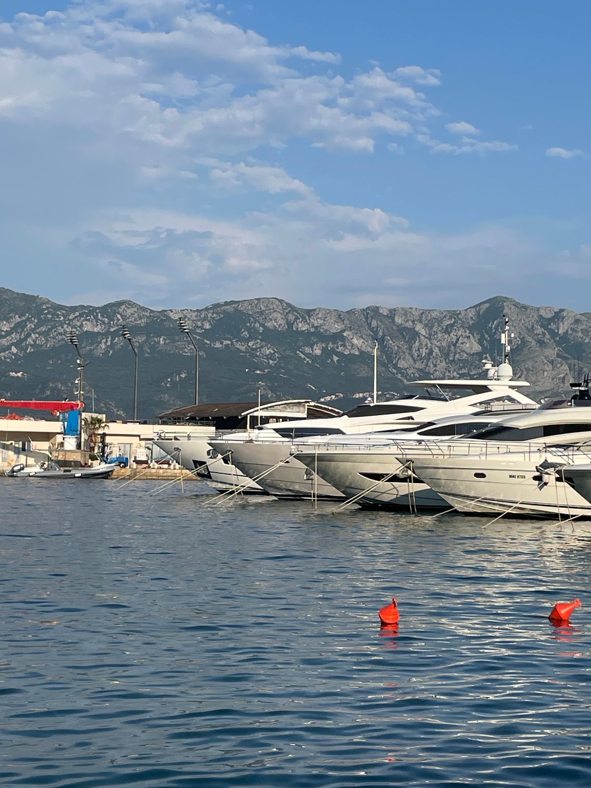 Tourist activities captured across Budva marina and beaches