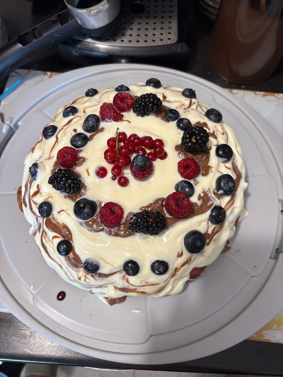 Berry cake, yogurt parfaits, and a Jack Russell at home