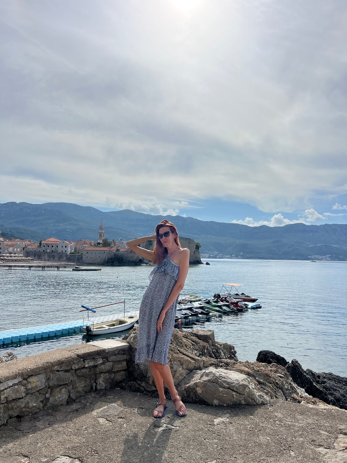 Morning tourist captures scenic Budva coastline and local cats