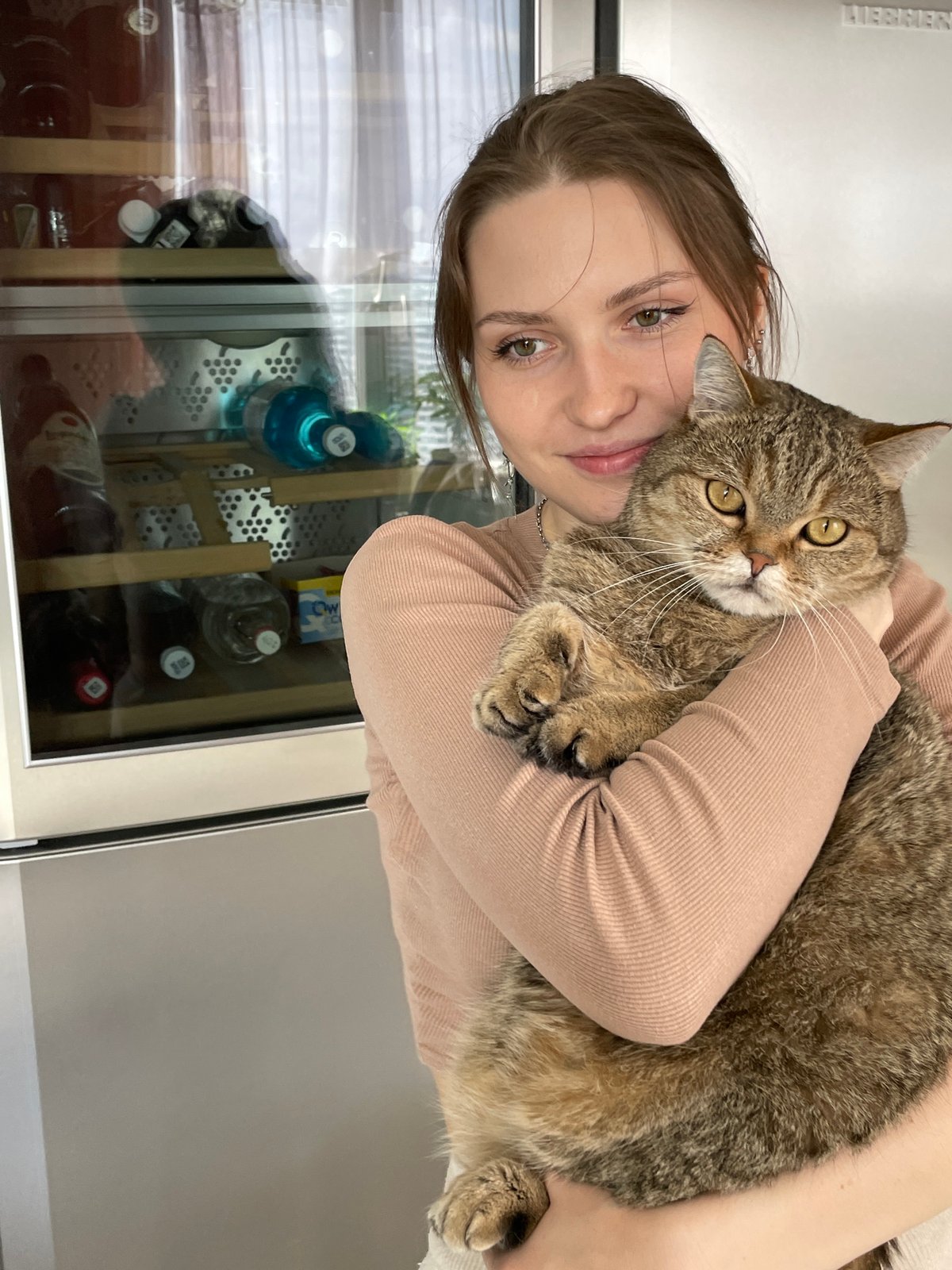 Morning routine documented with cat in Saint Petersburg