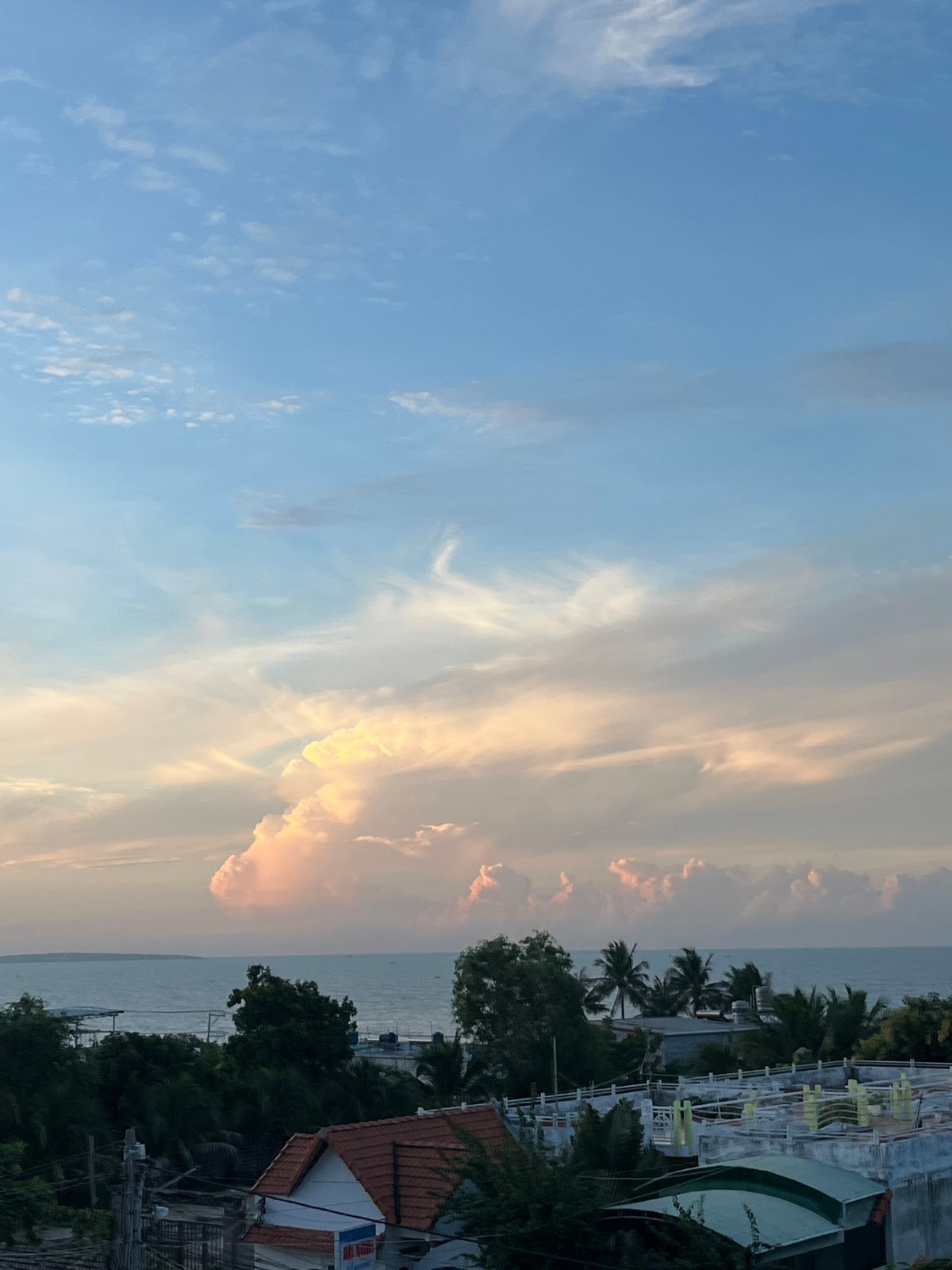 Golden hour on the Mũi Né coast, coffee and sea views