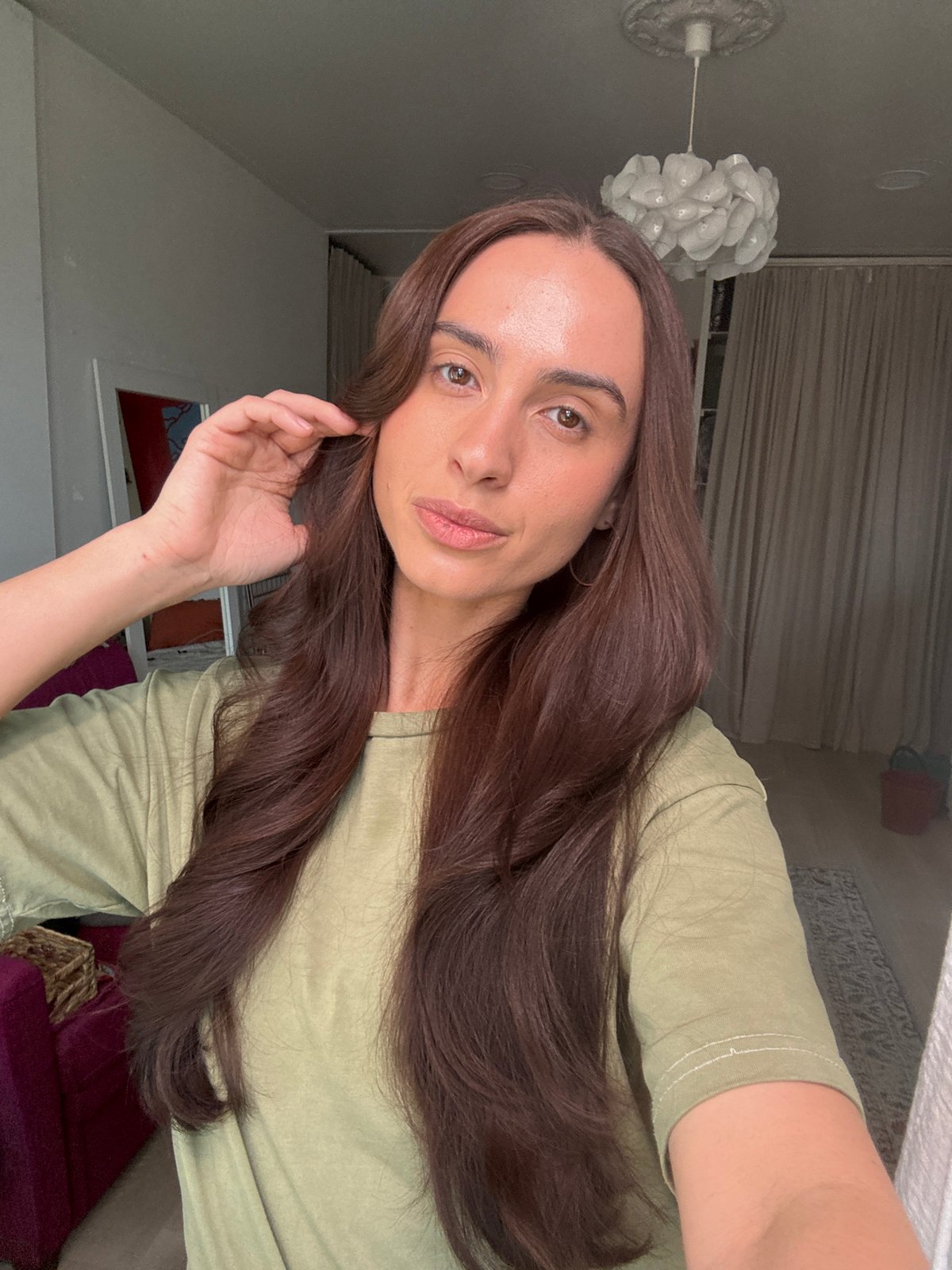 Woman Takes Indoor Selfie in Krasnoyarsk Home