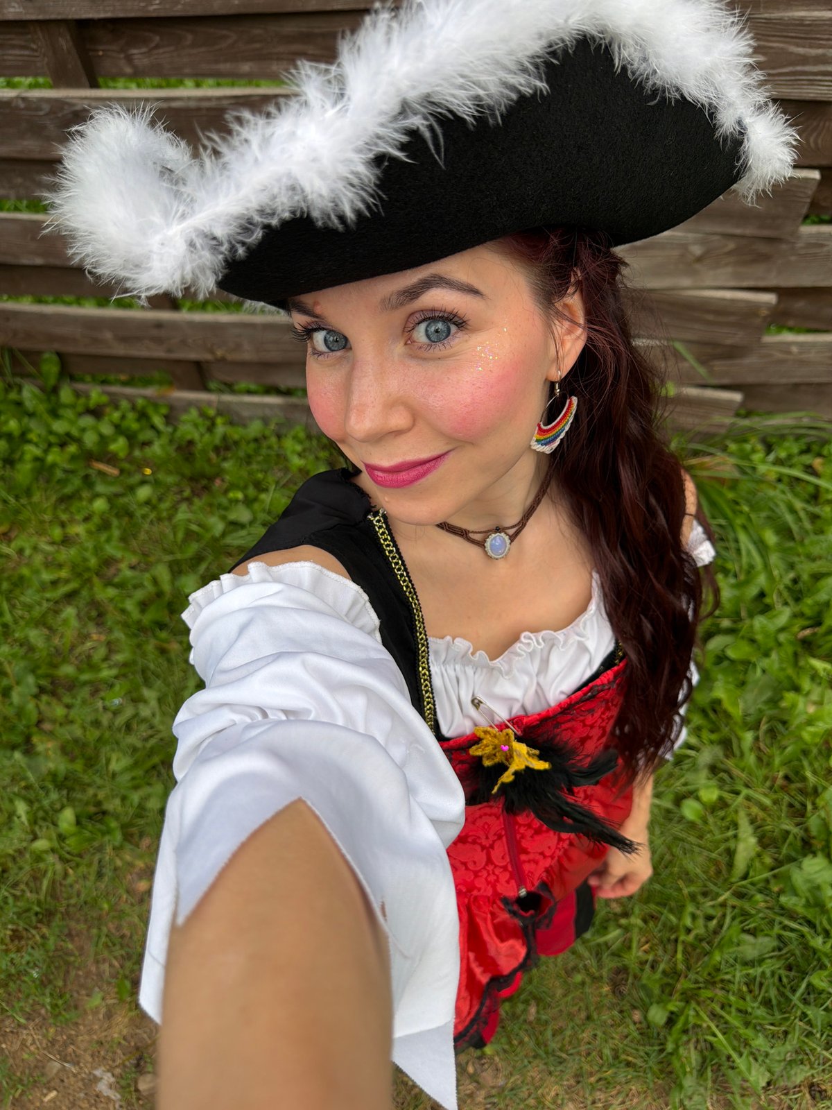 Pirate costume photoshoot in a grassy spot, Noviy Russia