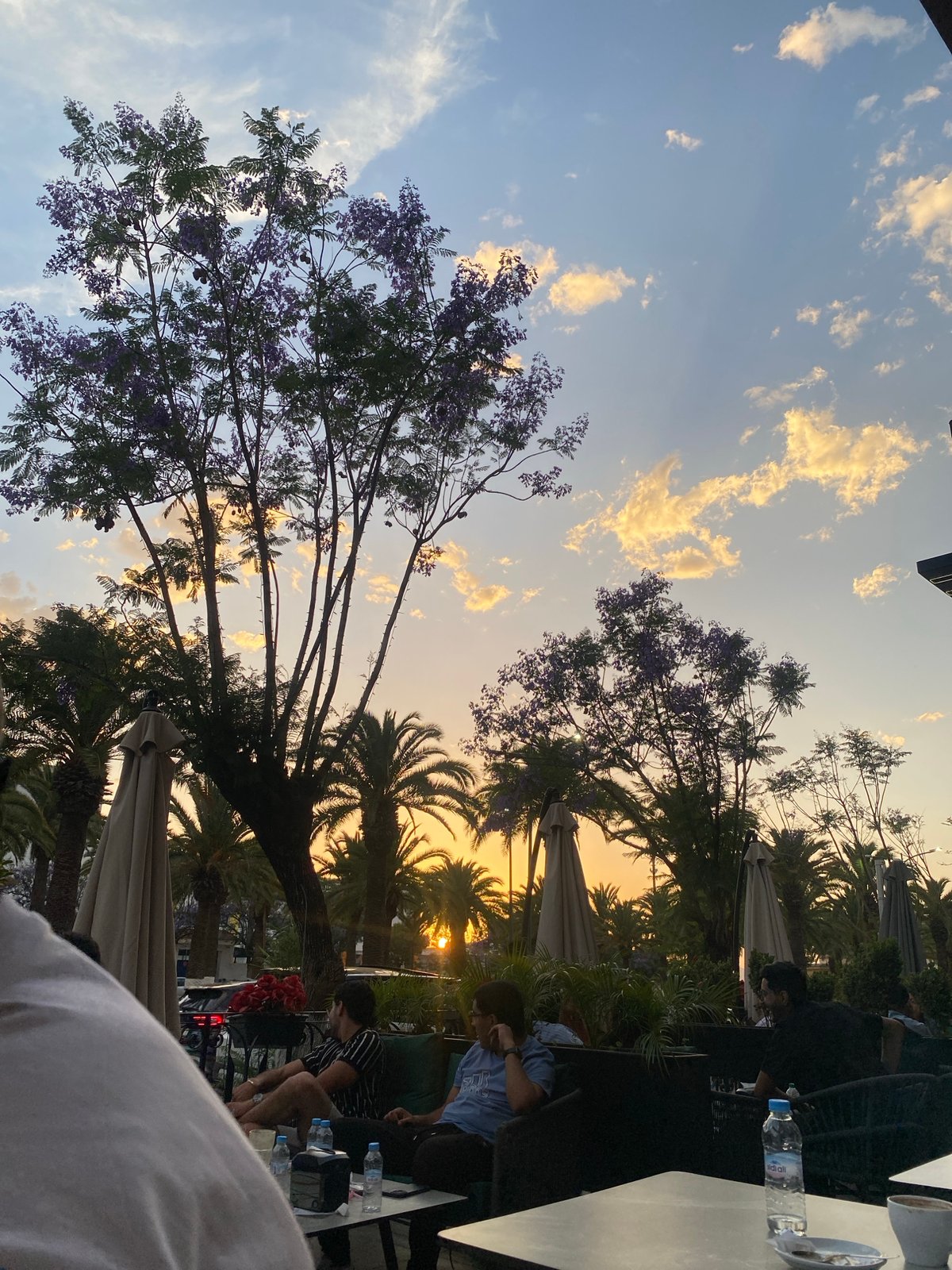 Evening dining scene captured at outdoor café in Meknes