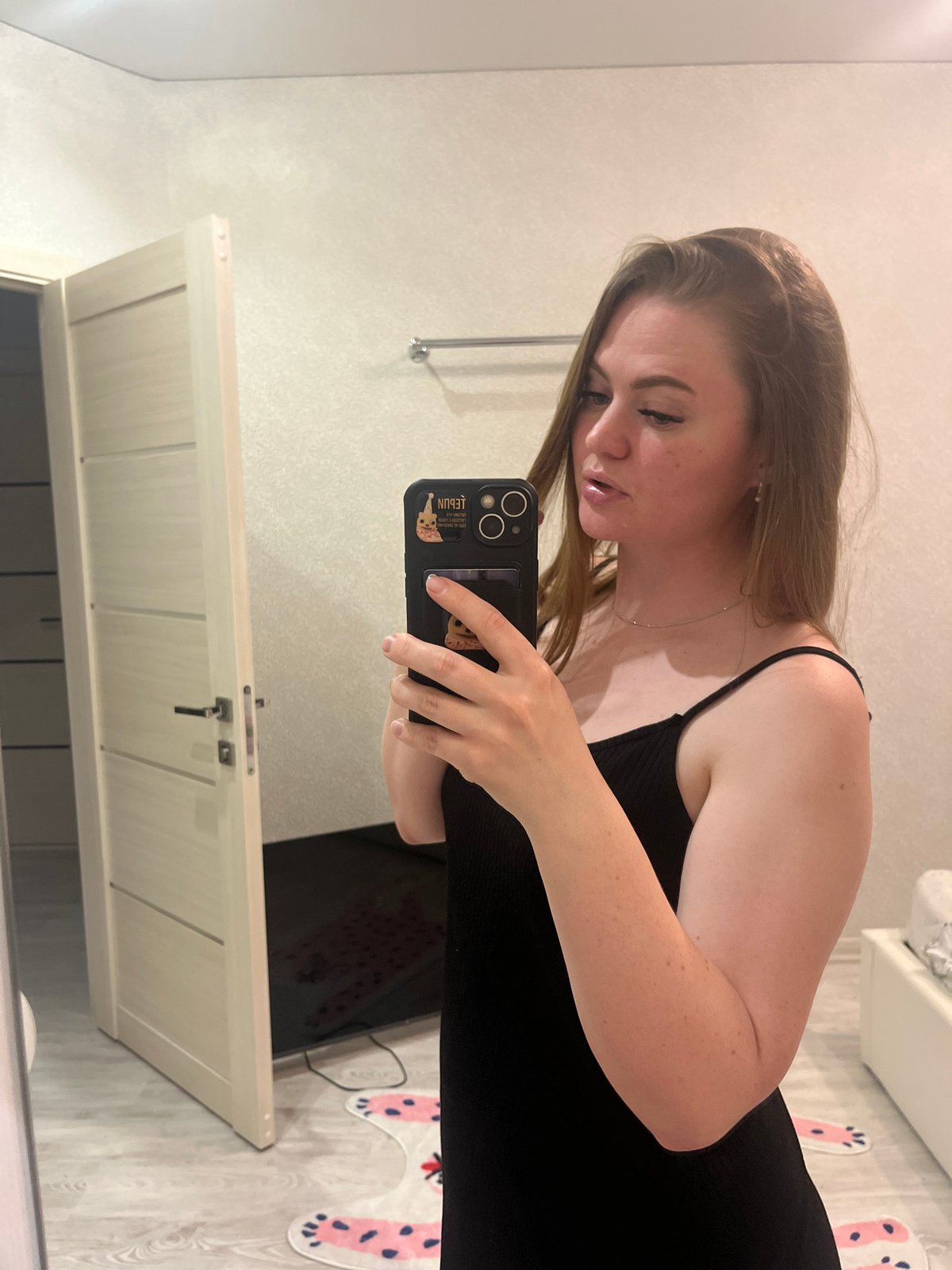 Woman Takes Mirror Selfies in Multiple Indoor Locations