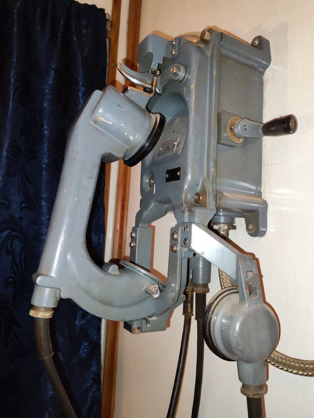 Vintage phone and industrial interior documented in Russian village