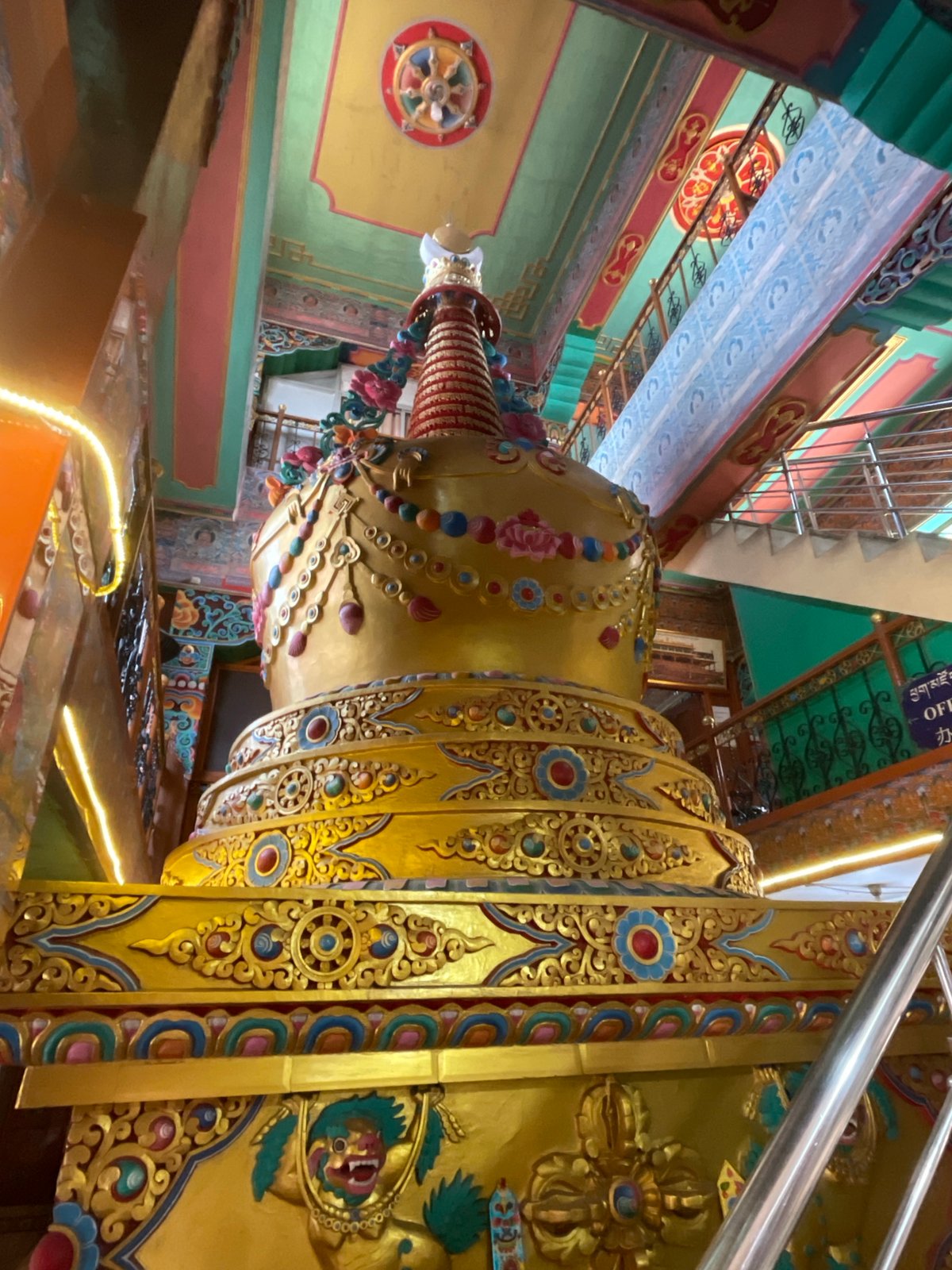 Visitor captures ornate gold temple details in Dharamshala