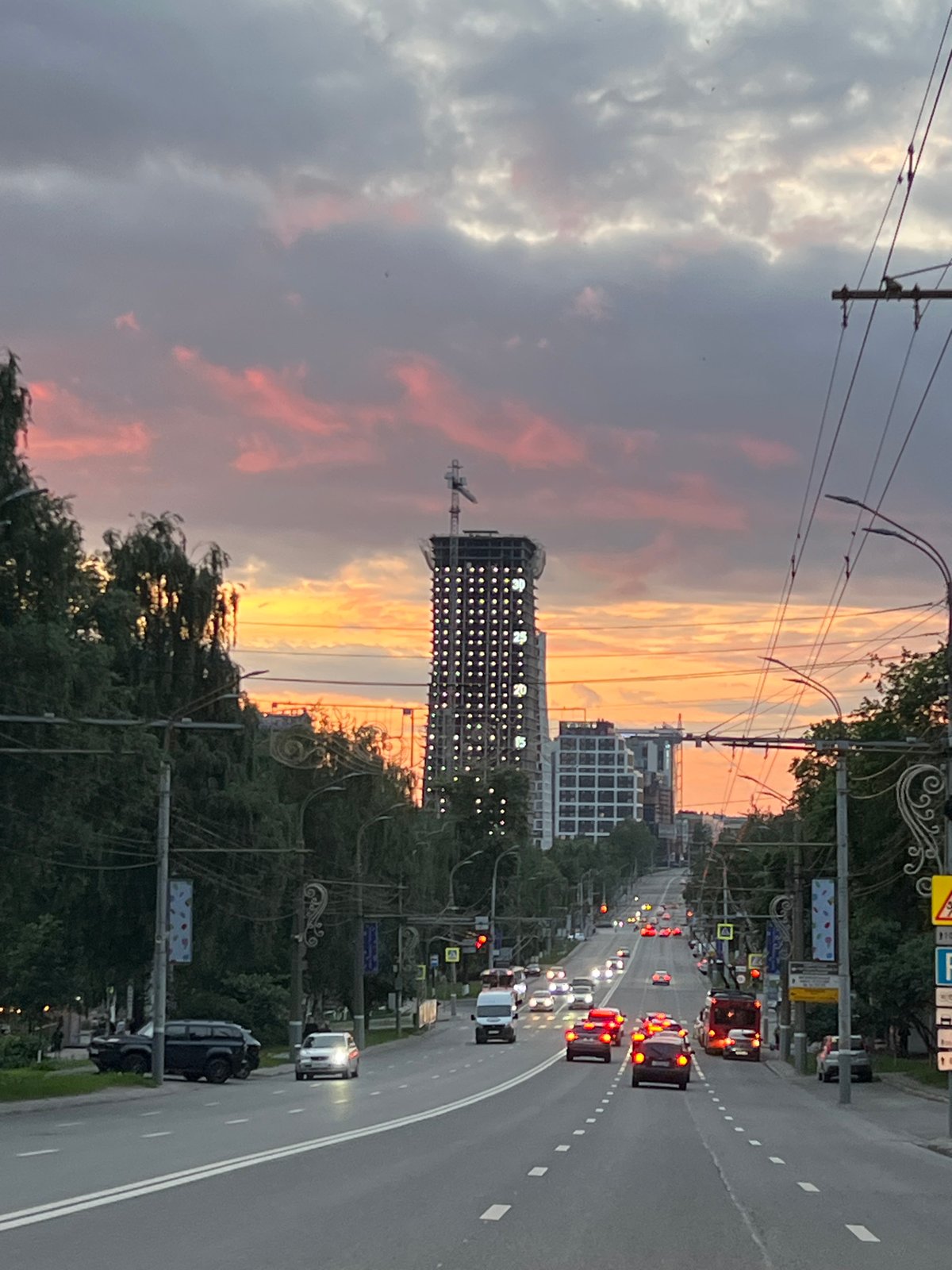 Dramatic sunset colors city skies over Izhevsk, Russia