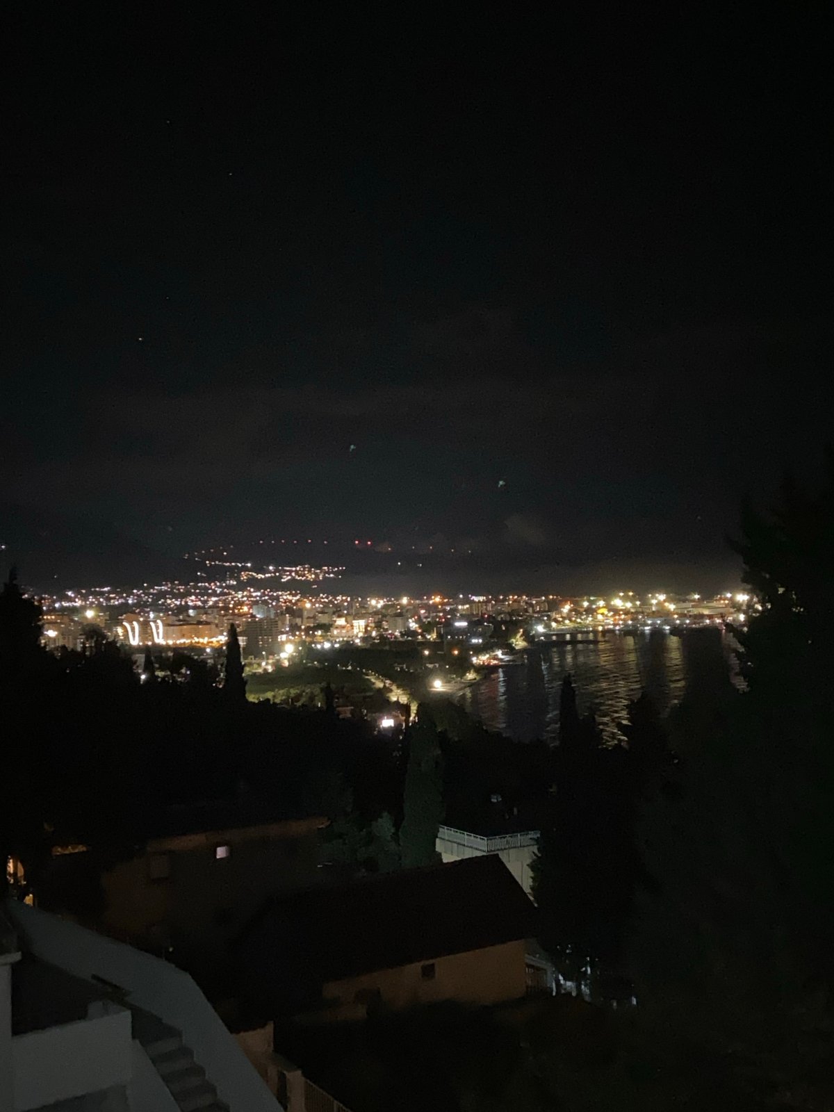 Nighttime coastal lights captured in Šušanj, Montenegro