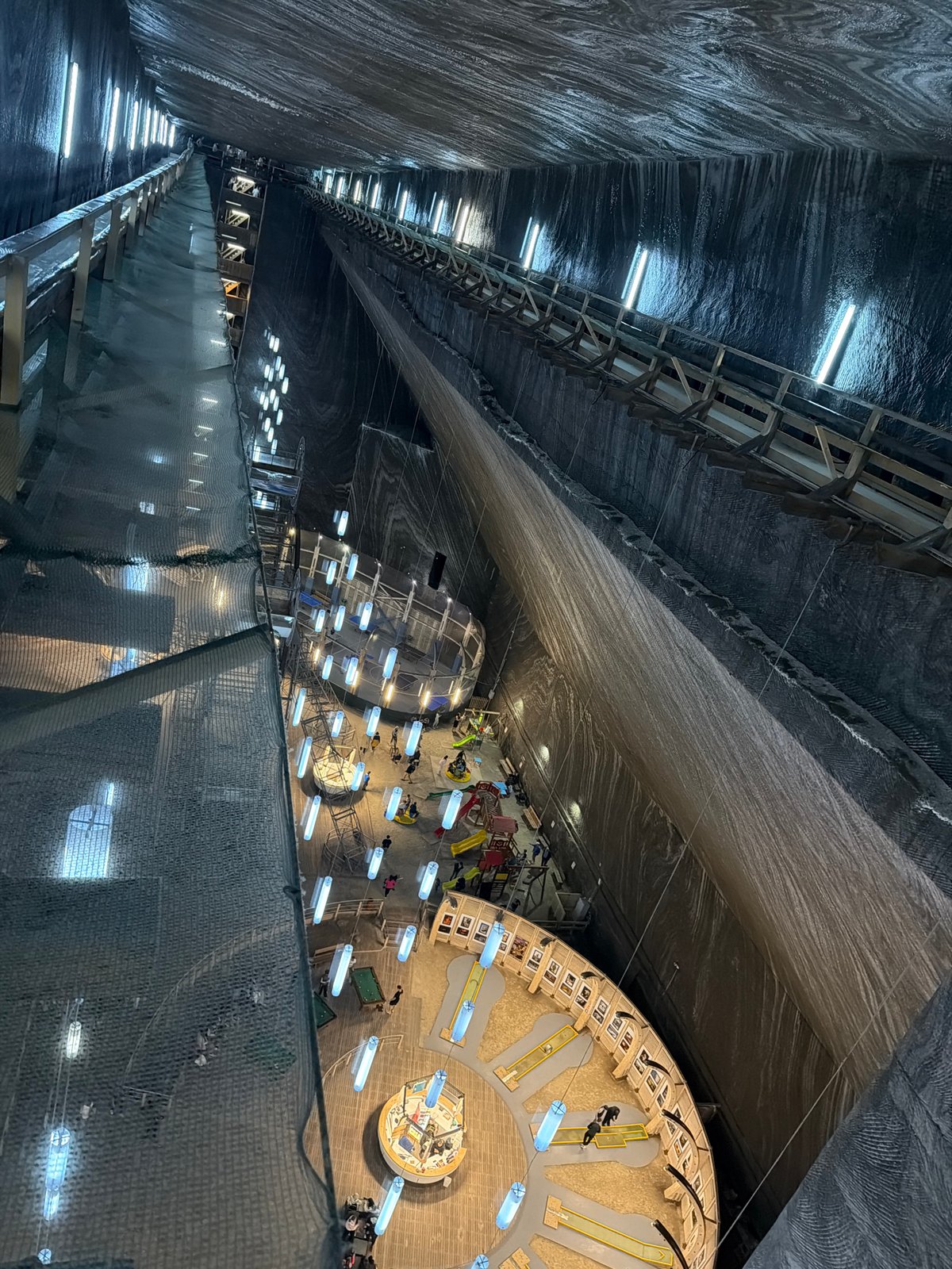 Tourist explores Salina Turda salt mine attraction in Romania