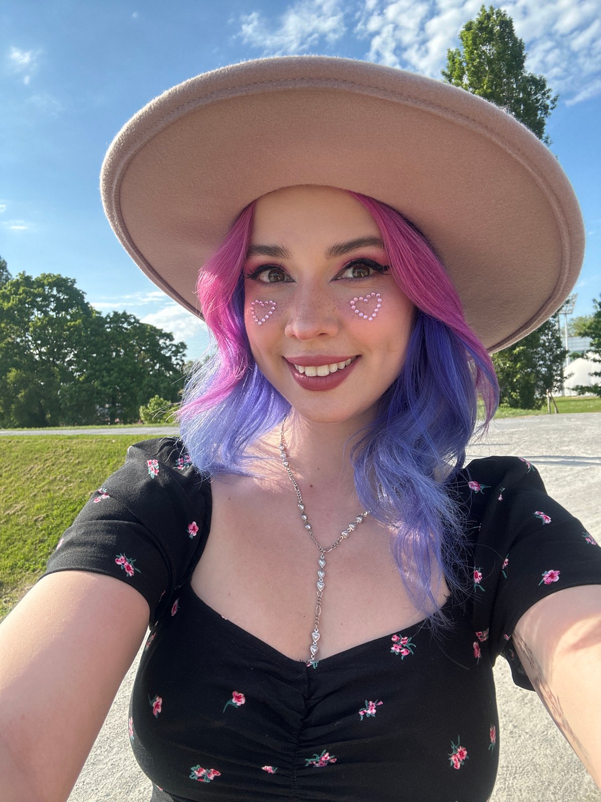 Woman takes selfie in sunny Zagreb park