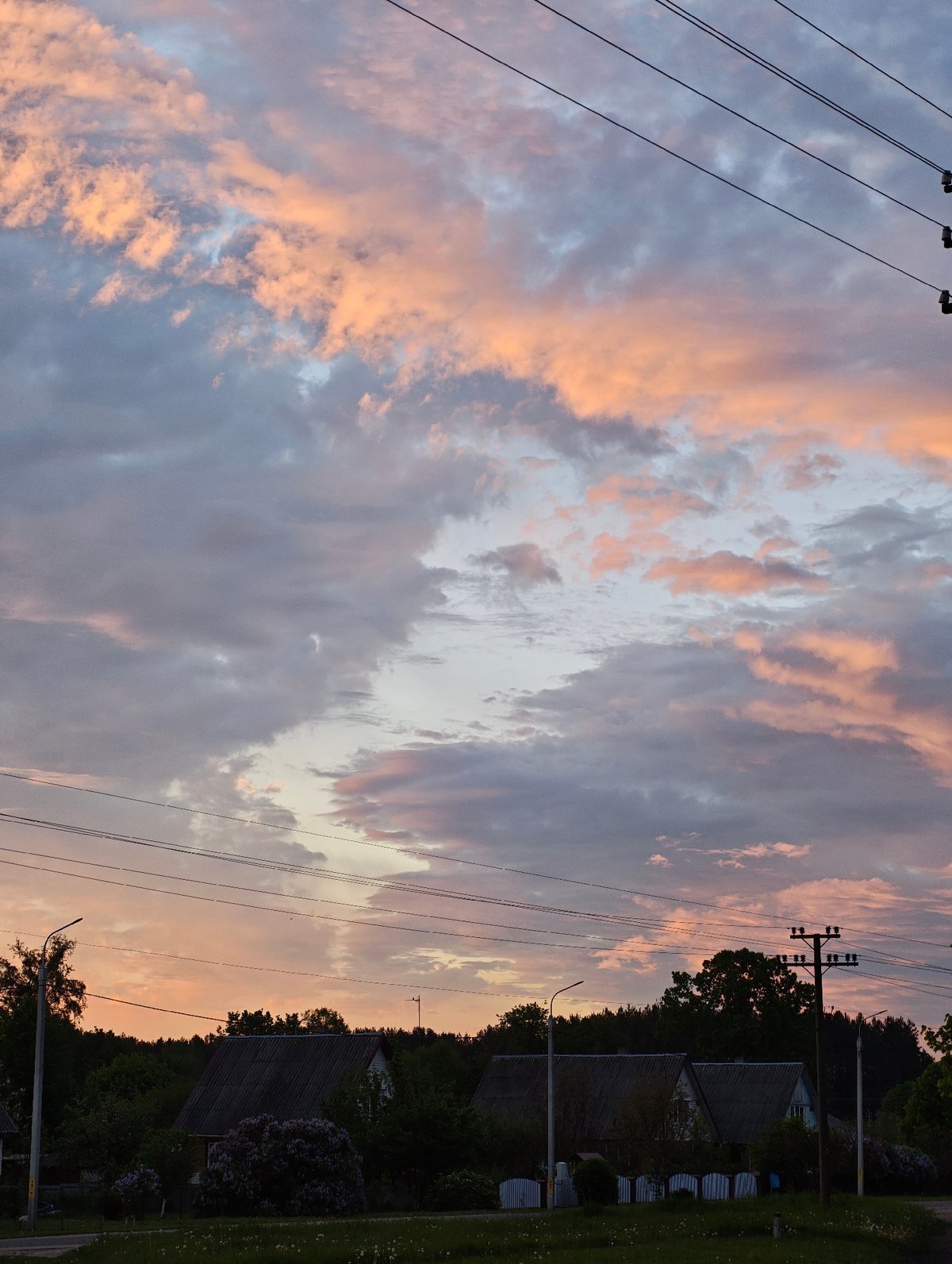Twilight sky with colorful clouds observed in rural area