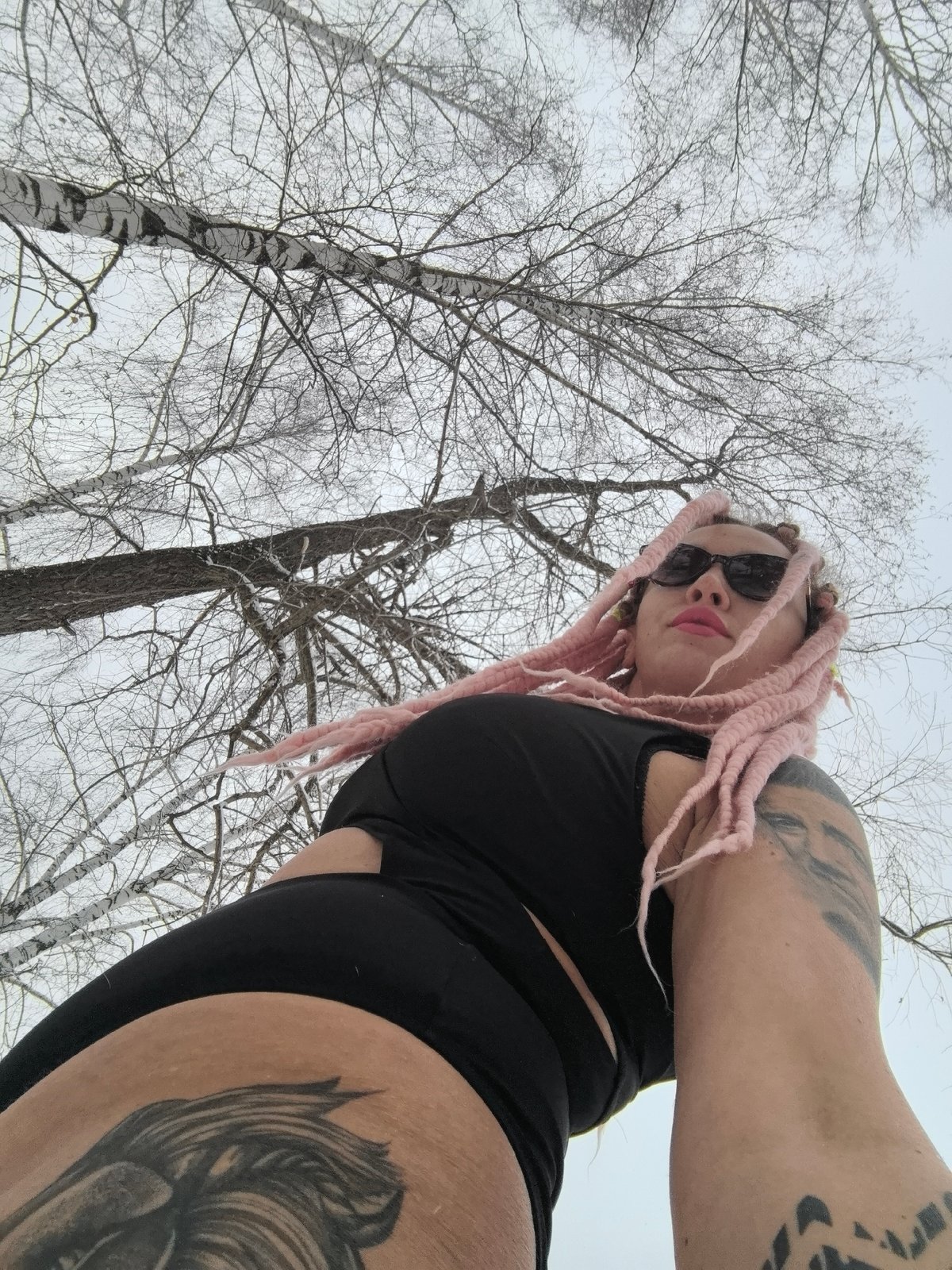 Woman poses for winter photo session in snowy Russia