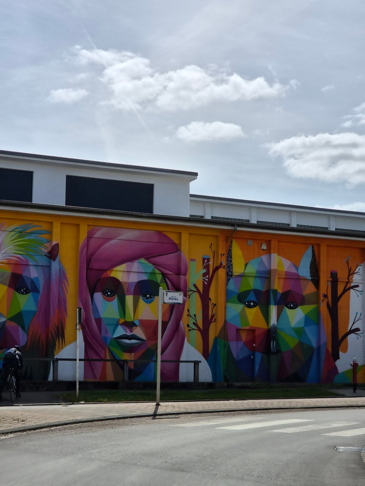 Vibrant geometric mural spotted on Esch-sur-Alzette building facade