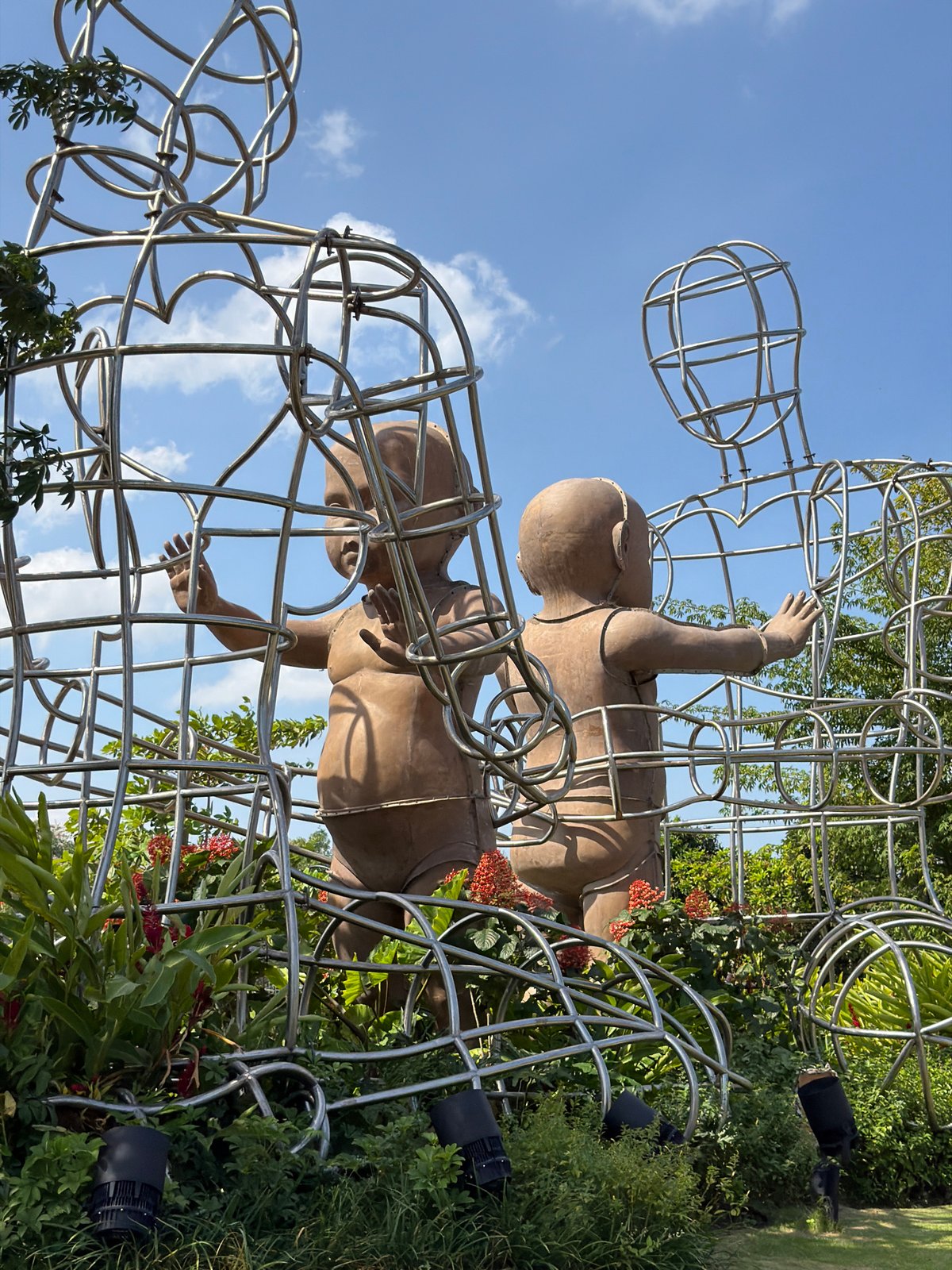 Abstract skeletal metal sculpture in Kediri's public space