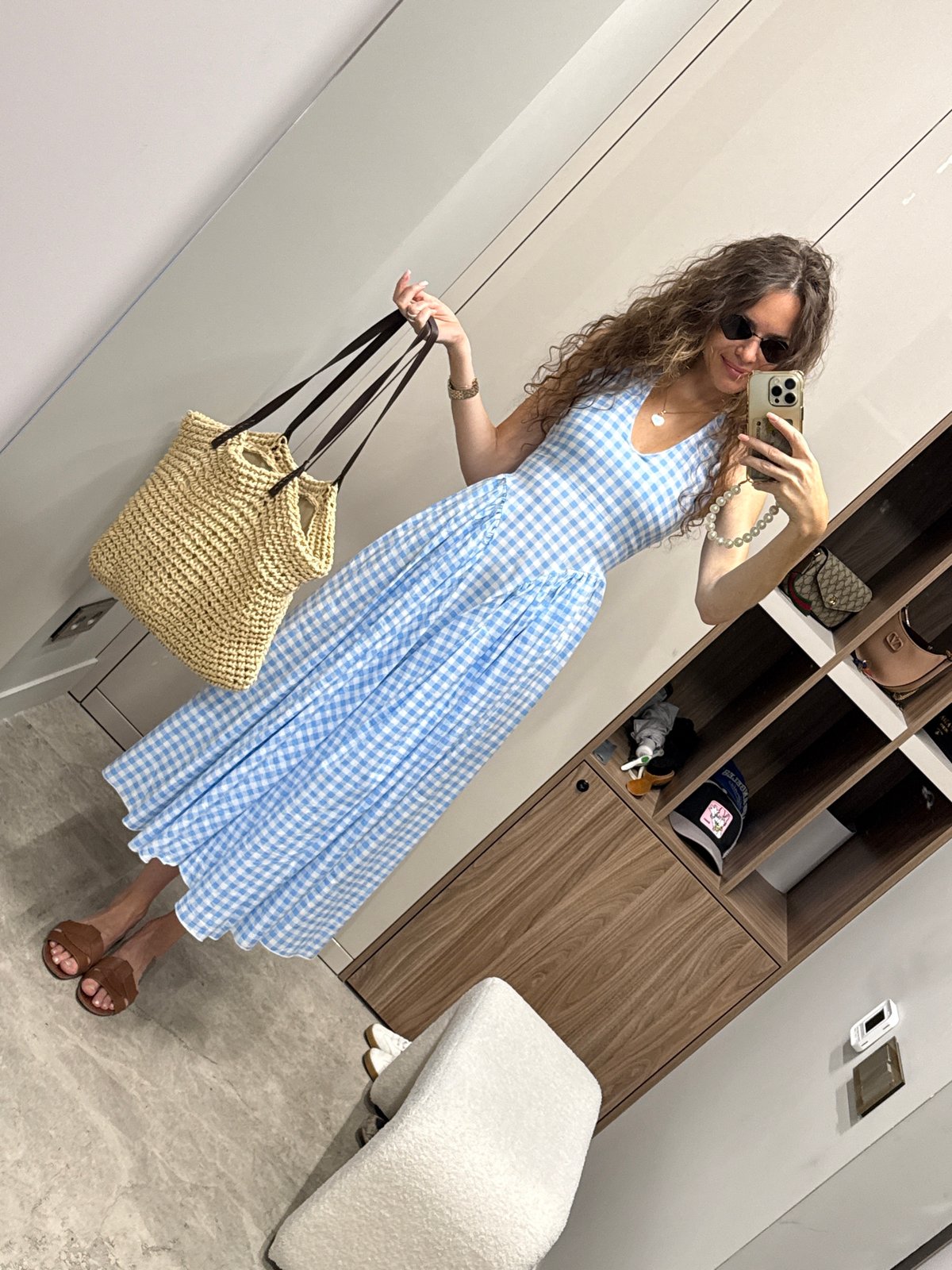 Mirror selfie in a Moscow dressing room, checkered midi dress