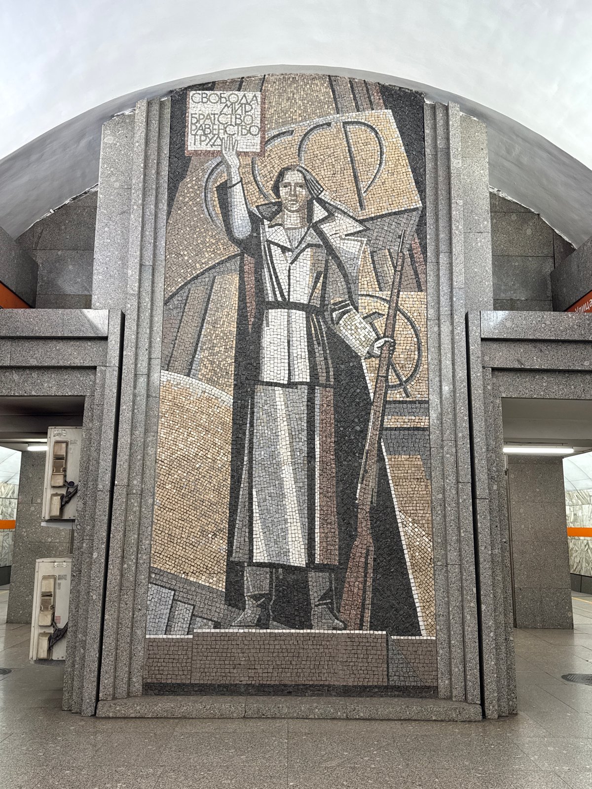 Metro passenger documents socialist art, train interior in Saint Petersburg