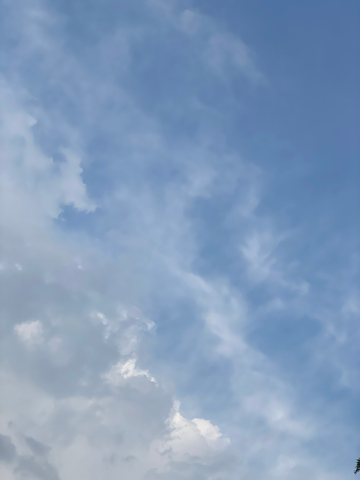 Fair weather with scattered clouds observed in urban area