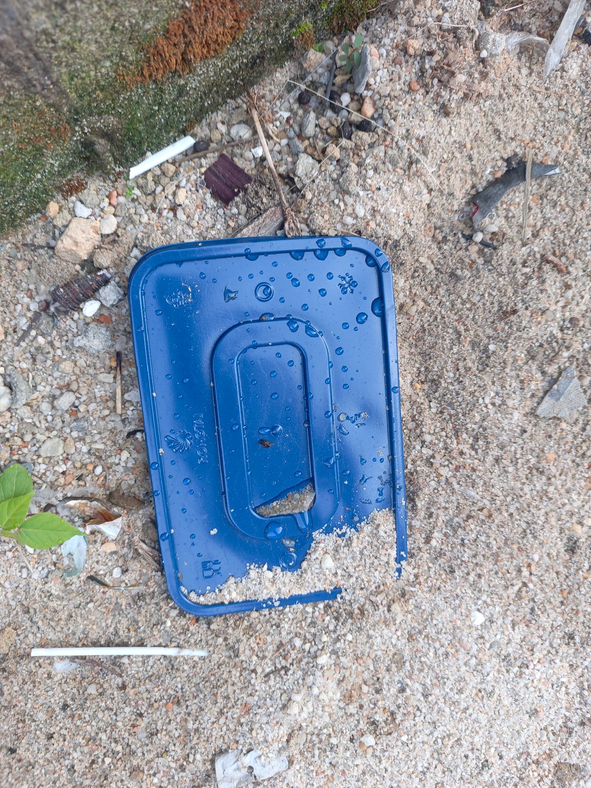 Debris field documented across sandy terrain in coordinated observation