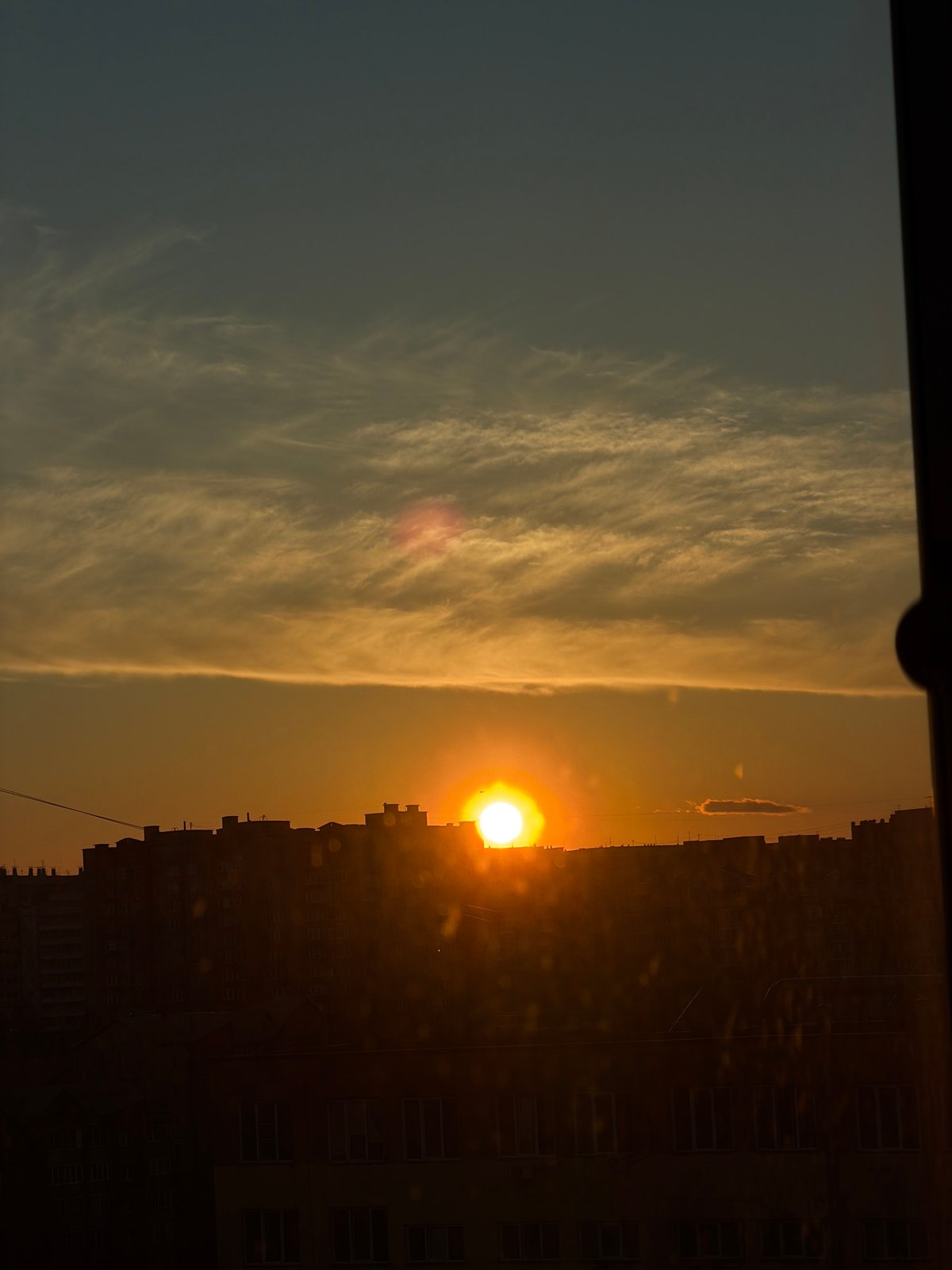Sunset observed over Krasnoyarsk urban skyline, May 7